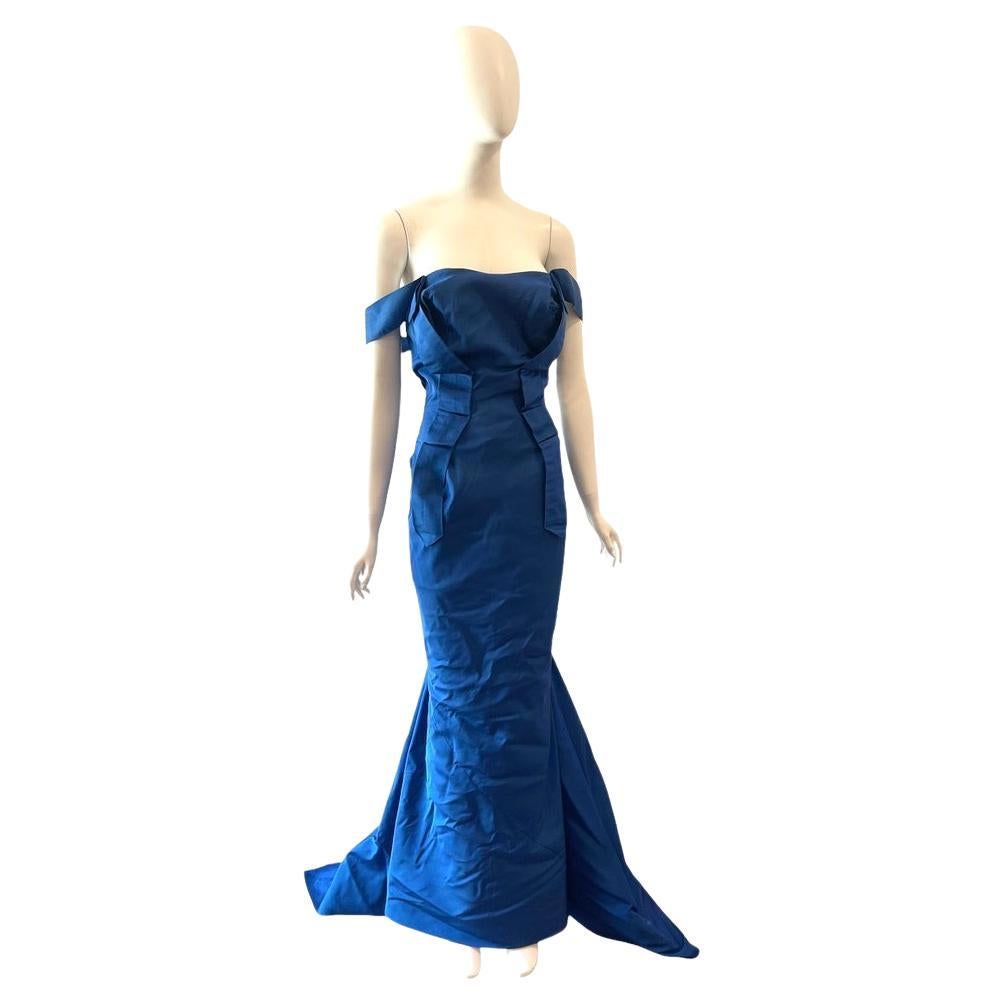 Vivienne Westwood blue taffeta gown
gold label
off the shoulder, fishtail train
fitted waist
Condition: Good, some wear and spotting near hem
Bust 34