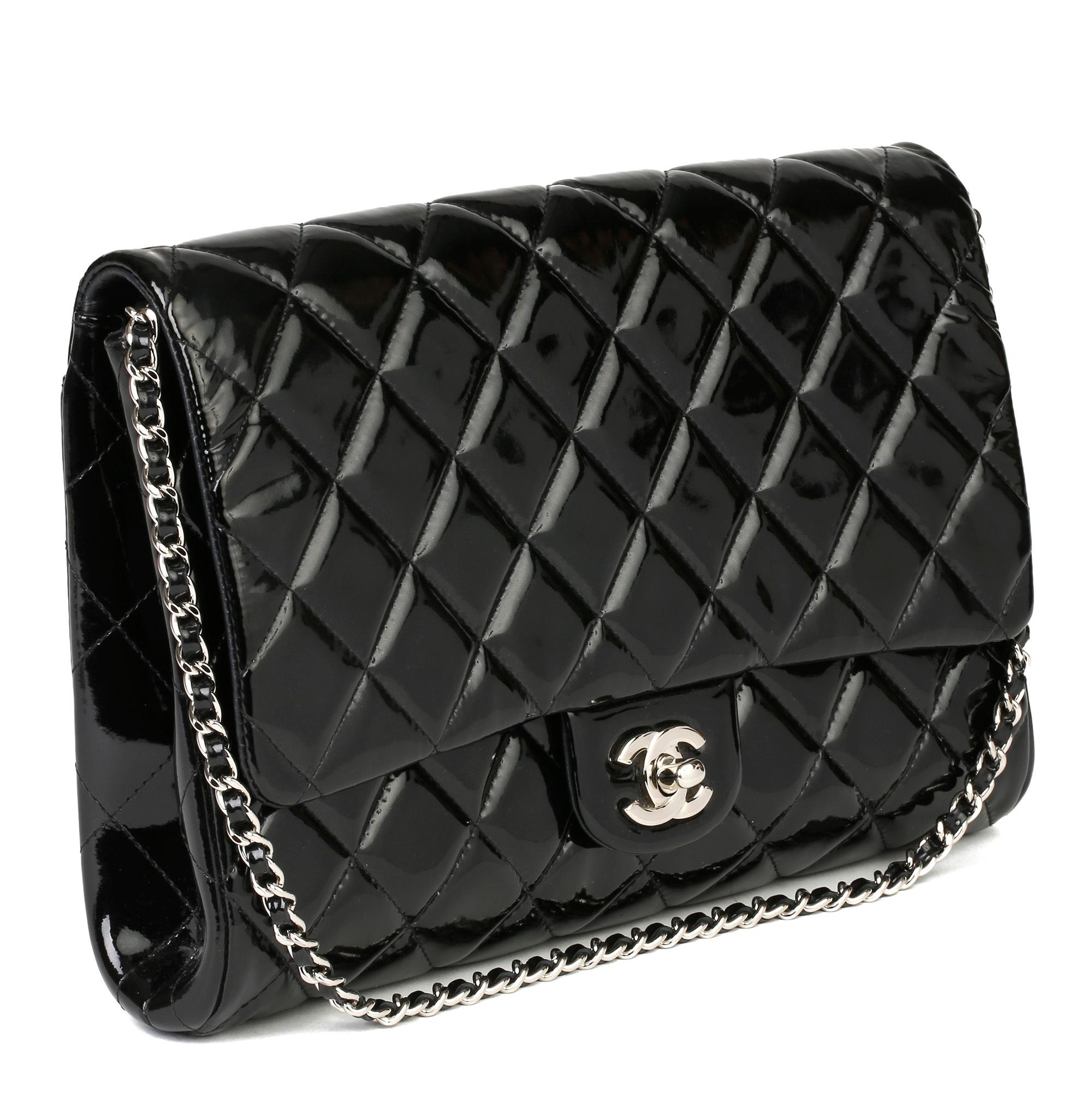 CHANEL
Black Quilted Patent Leather Classic Clutch on Chain

Xupes Reference: HB3915
Serial Number: 17548973
Age (Circa): 2012
Accompanied By: Chanel Dust Bag, Authenticity Card, Care Booklet, Protective Felt
Authenticity Details: Authenticity Card,