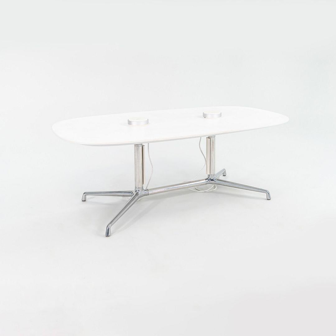 This is a SW_1 Conference Table, originally designed by Scott Wilson in 2010. This particular example was produced by Steelcase in the USA C. 2012. The table is comprised of an aluminum base and features a white laminate tabletop. 

The conference