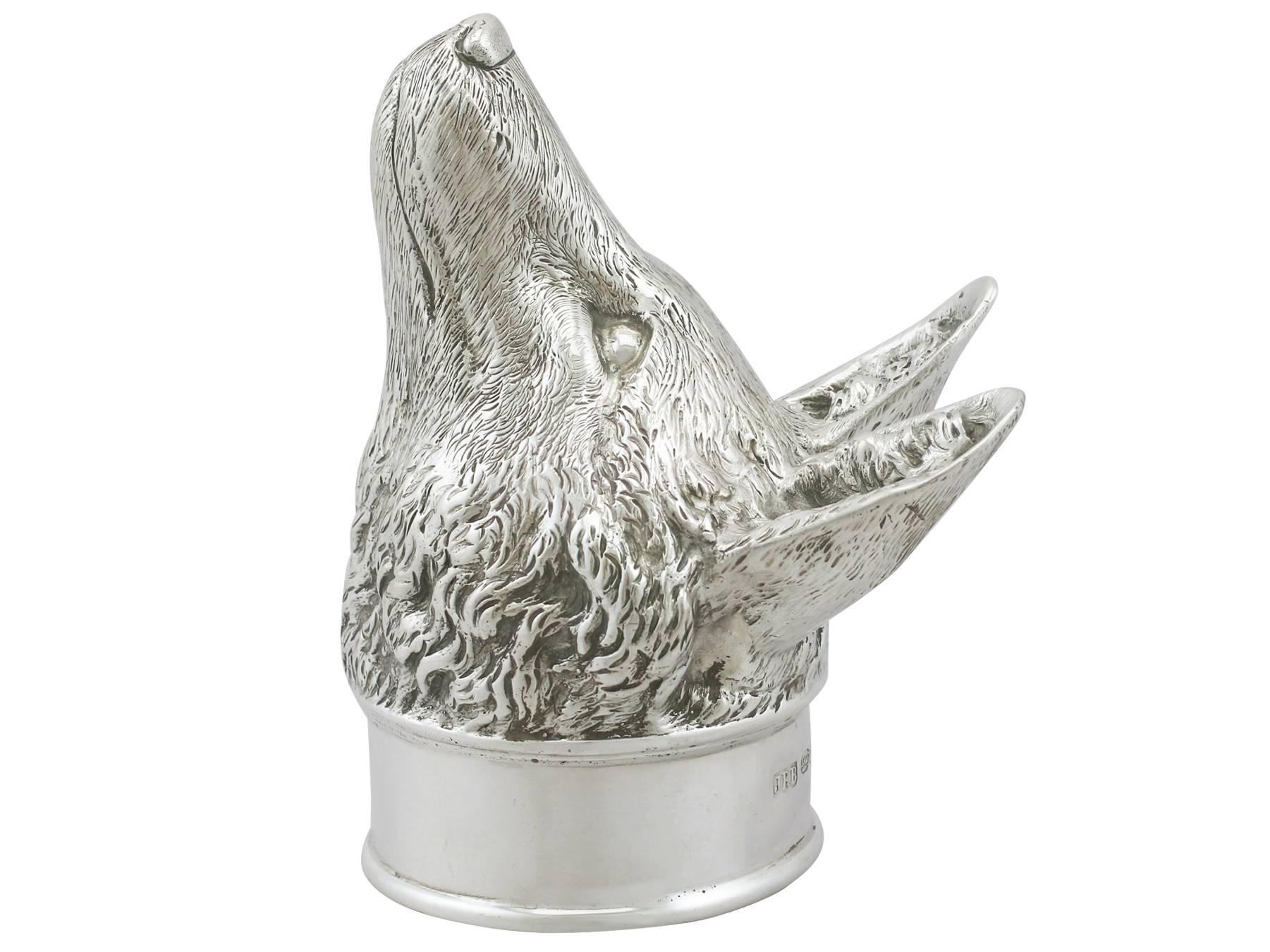 An exceptional, fine and impressive contemporary cast sterling silver stirrup cup modelled in the form of a fox's head, an addition to our diverse silver drinking vessels collection.

This exceptional contemporary cast sterling silver stirrup cup