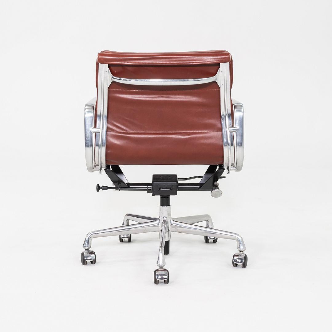 Aluminum 2012 Herman Miller Eames Soft Pad Management Desk Chair In Dark Rust Leather For Sale
