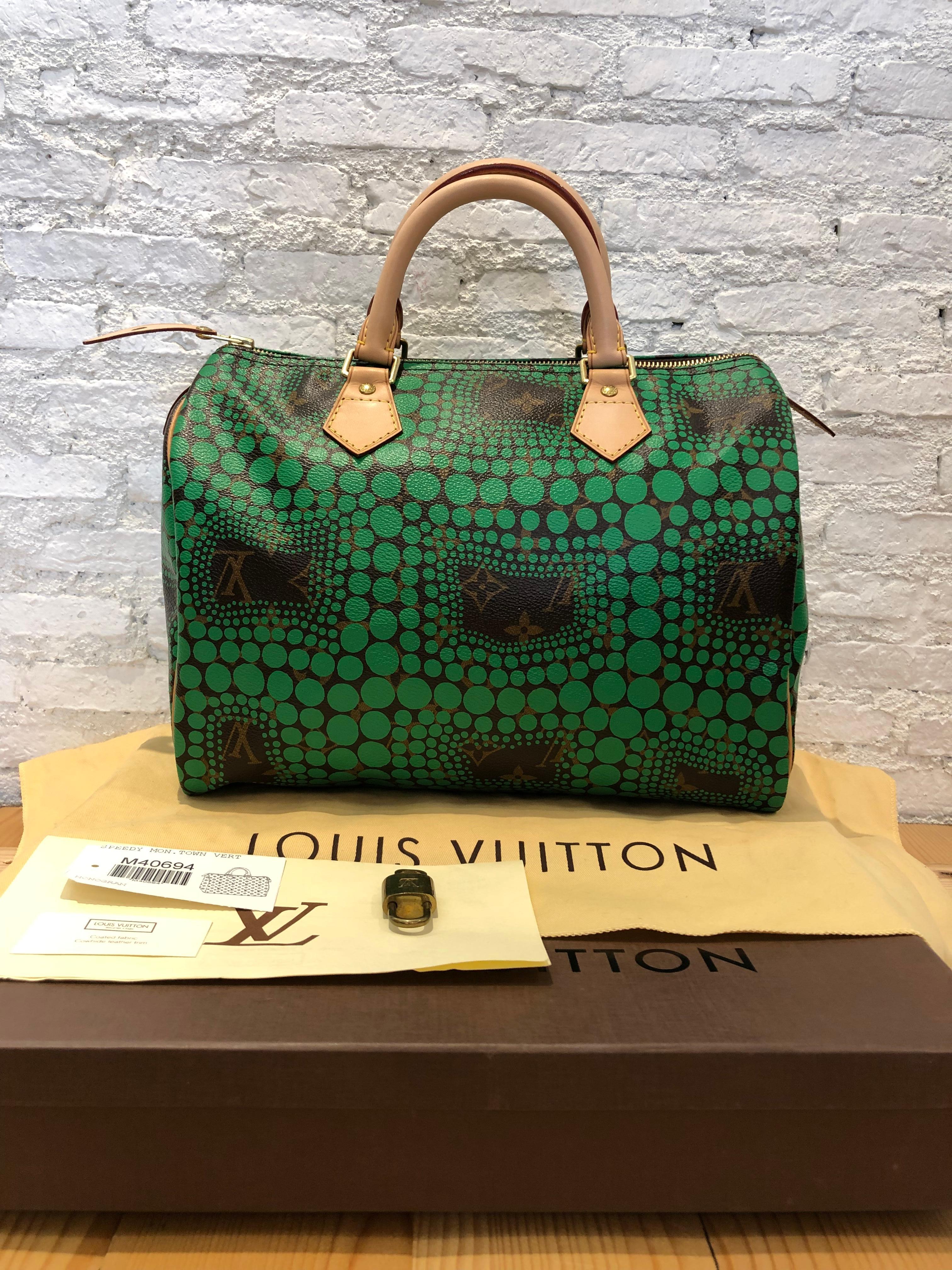 This LOUIS VUITTON Speedy Town is crafted of LV's monogram canvas in brown and natural cowhide leather featuring iconic polka dots in green designed by renowned Japanese artist Yayoi Kusama. This is Yayoi’s first ever collaboration with Louis