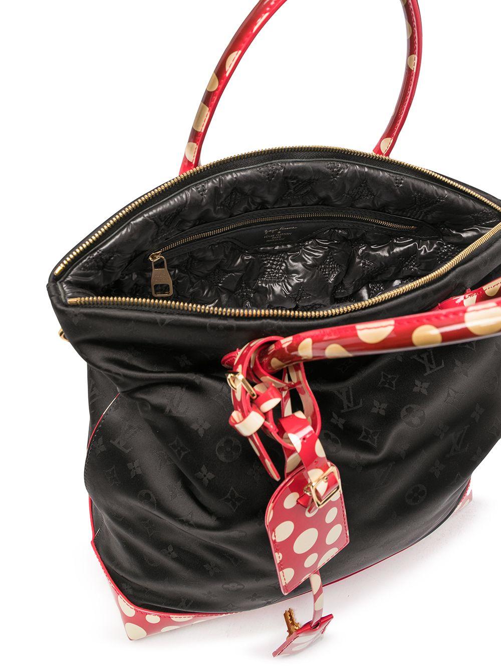 From the iconic collaboration with Yayoi Kusama in 2012. This pre-owned Louis Vuitton Lockit bag has been crafted from their classic monogram print in black nylon and styled with signature infinity dots on red vernis leather. Featuring two top