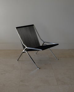 2012 Poul Kjaerholm Lounge chair, model no. PK25 for Fritz Hansen, Denmark.