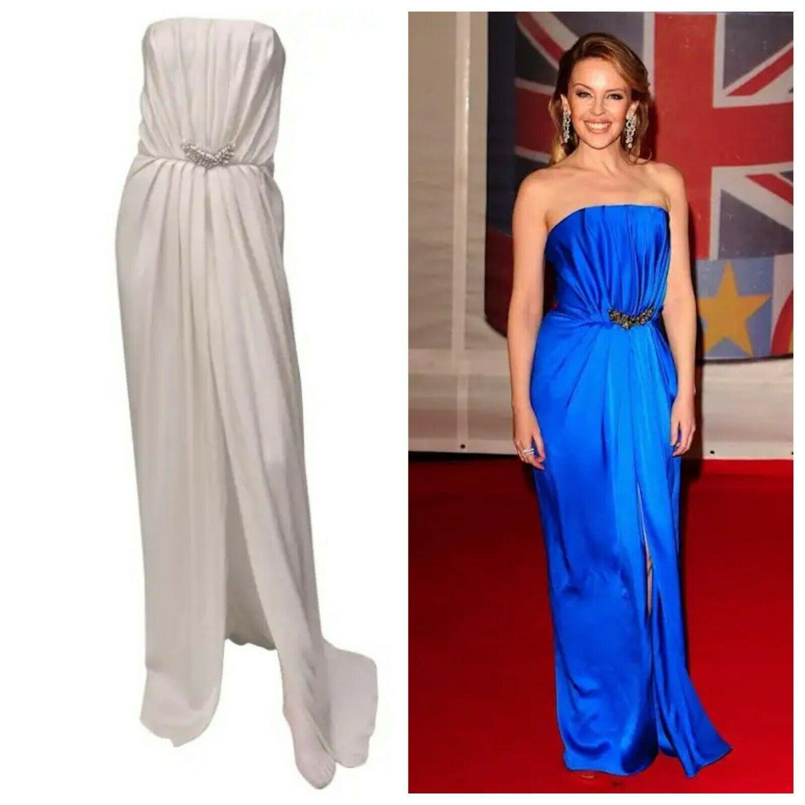 Carla Bruni-Sarkozy looked stunning in this column dress by Saint Laurent.
Kylie Minogue wore the same gown to the BRIT Awards.
Now it's your chance to own this delicate and incredibly elegant creation.
Color: White
100% Silk
Crystal