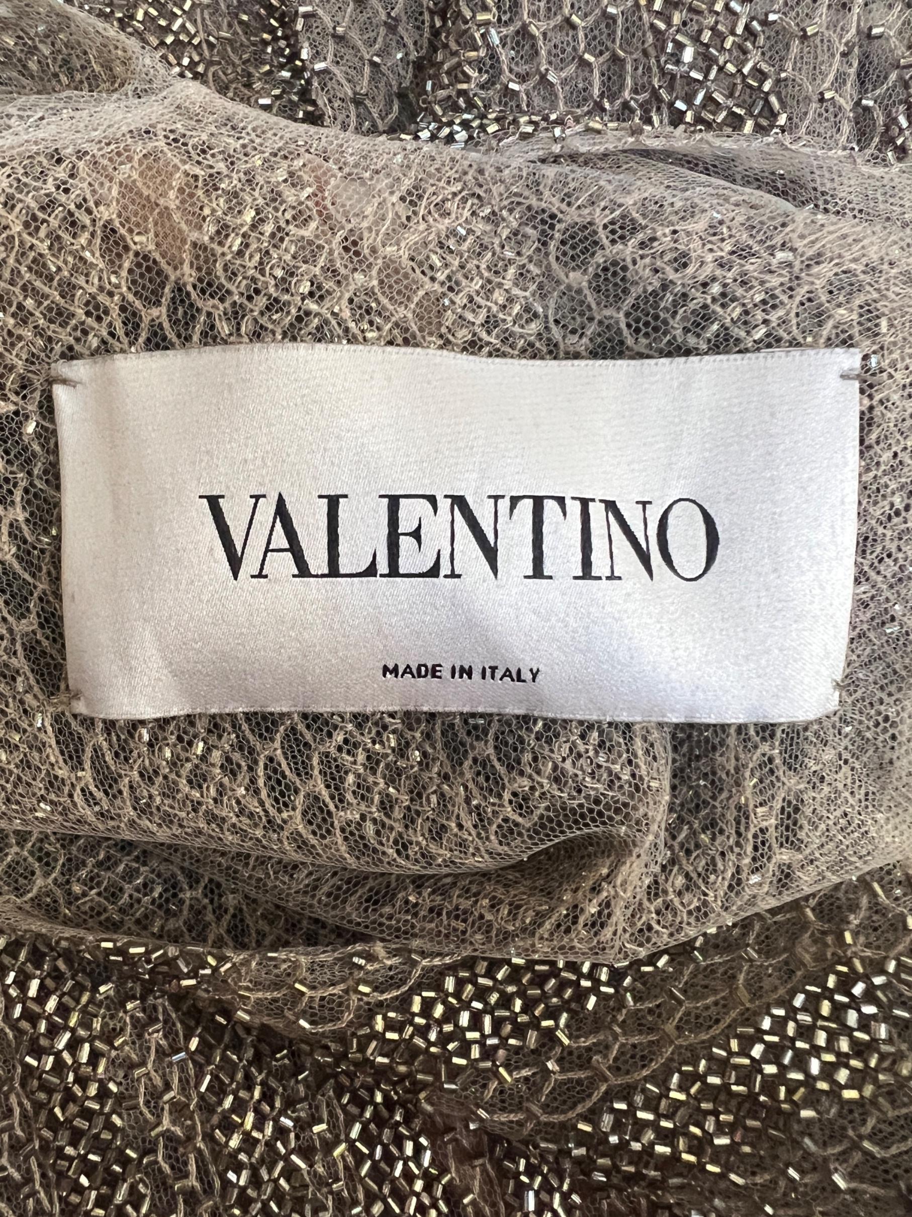 Donna 2012 La passerella di Valentino ha documentato il maxi-abito d'oro con perline pesanti in vendita
