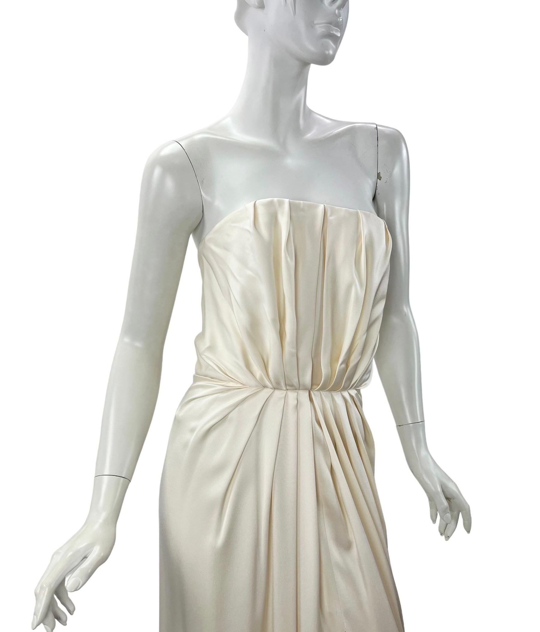 2012 Yves Saint Laurent
Edition Soir
Embellished Strapless Silk Dress. 
Carla Bruni-Sarkozy looked stunning in this column dress.
Kylie Minogue wore the same gown to the BRIT Awards.
Now it's your chance to own this delicate and incredibly elegant