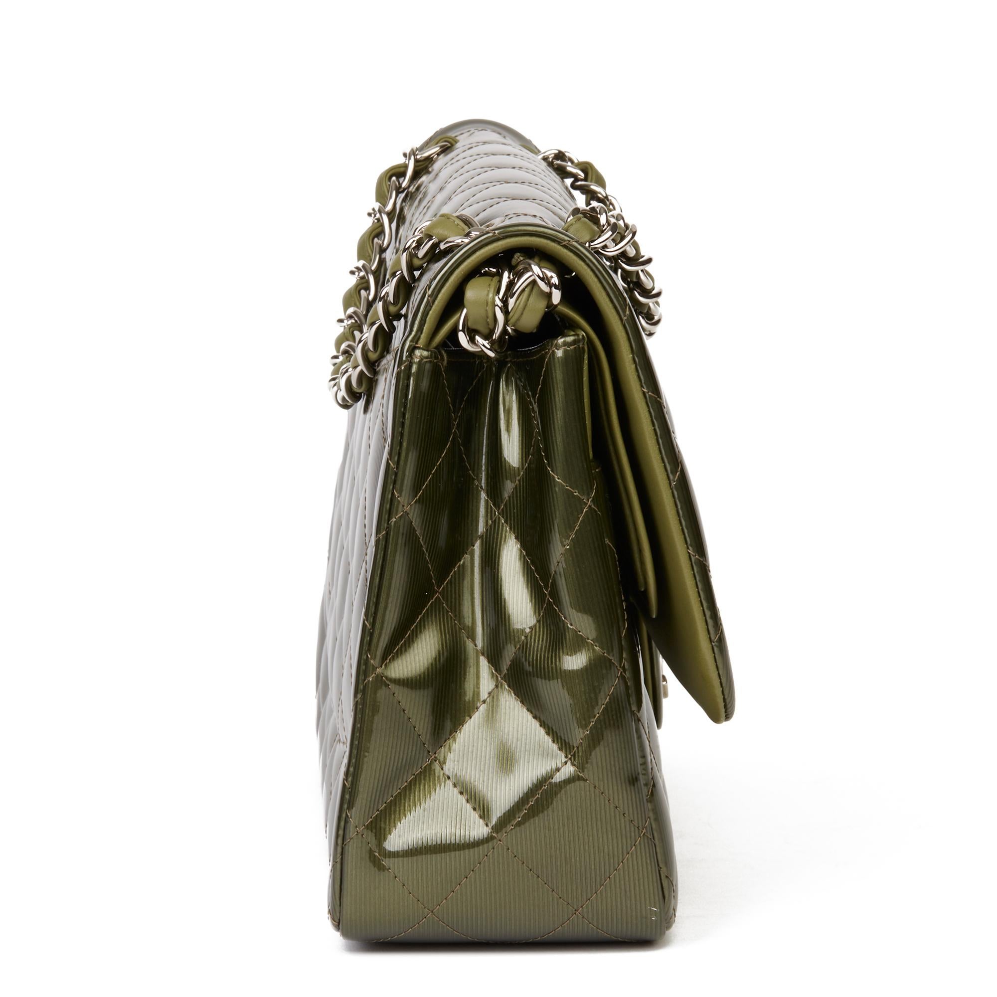 CHANEL
Green Vertical Embossed Patent Quilted Leather Jumbo Classic Double Flap Bag 

Xupes Reference: HB3381
Serial Number: 17020776
Age (Circa): 2013
Accompanied By: Chanel Dust Bag, Box, Care Booklet, Authenticity Card
Authenticity Details: