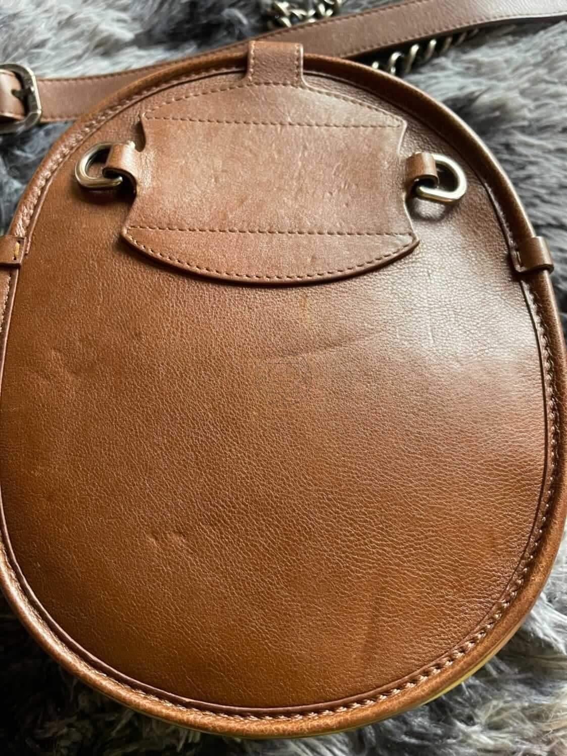 Beautiful round calfskin quilted bag with pony hair, chain and tassel detailed bag from pre-fall 2013 collection. Comes in classic camel brown color. Overall in great condition, no balding on the pony hair panel that tends to happened. Light dents
