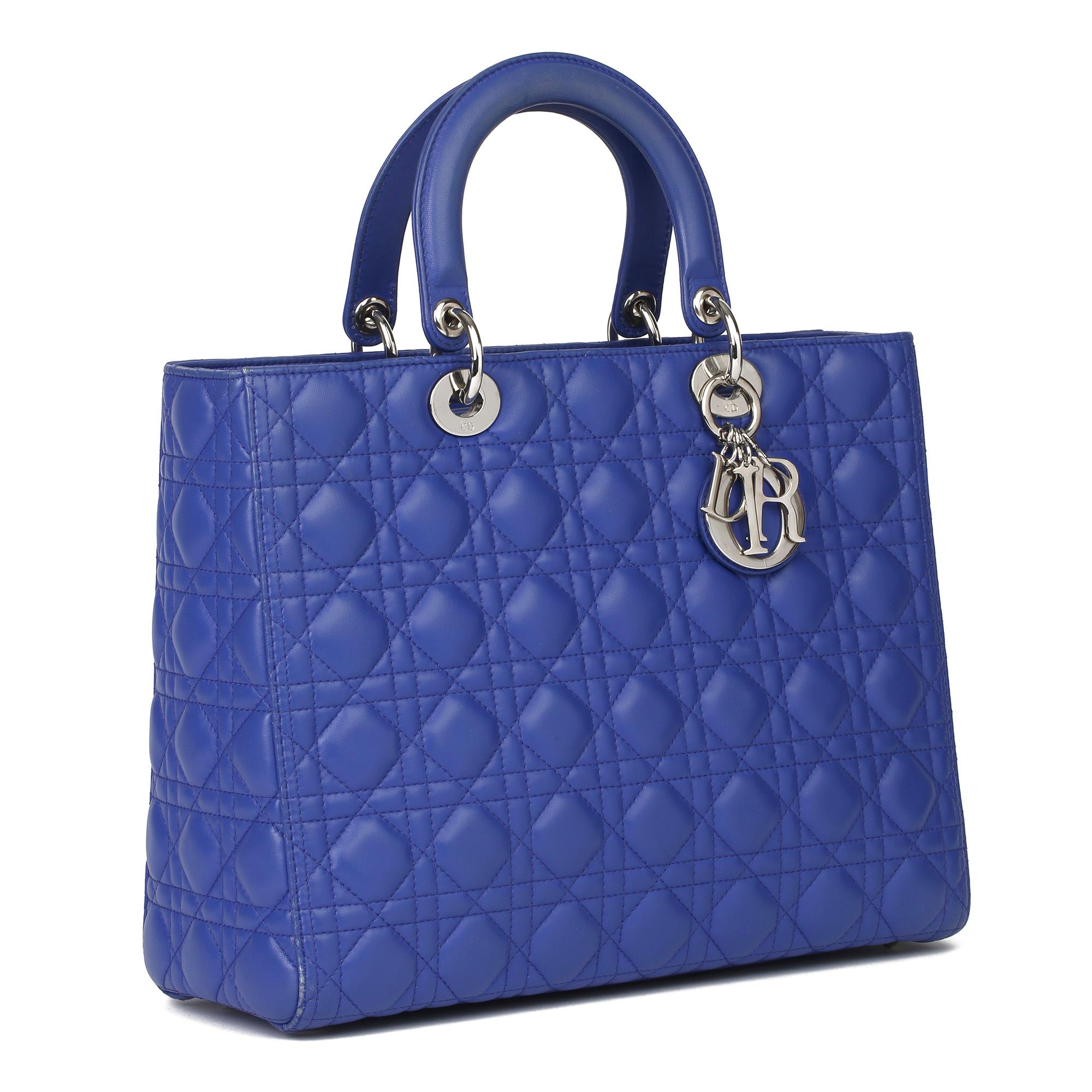 CHRISTIAN DIOR
Purple Quilted Lambskin Leather Lady Dior GM

Xupes Reference: CB335
Serial Number: 05-MA-0113
Age (Circa): 2013
Accompanied By: Authenticity Card, Care Booklet, Shoulder Strap 
Authenticity Details: Date Stamp (Made in Italy)
Gender: