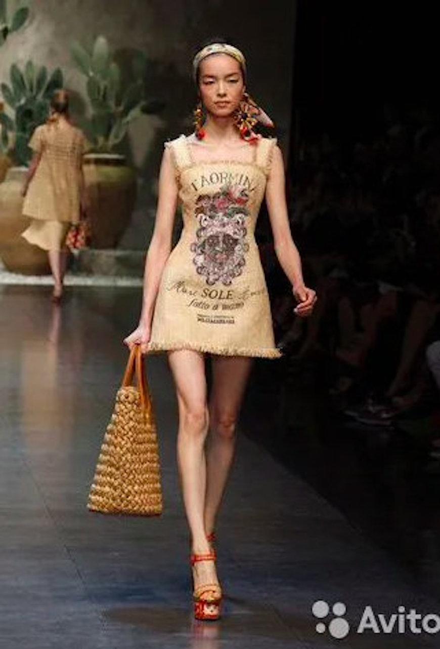 Dolce & Gabbana raffia dress from 2013 dress.
Sackcloth Straw with silk lining 
Size: IT - 40, US - 4
Made in Italy
Excellent condition
