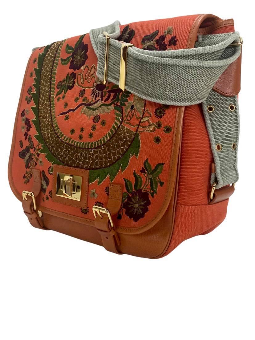 Resort 2013 
Emilio Pucci 
Large Crossbody Orange Bag with Dragon Embroidery

Canvas, leather trim, gold tone hardware
Silk lining
Inner pocket

New, in excellent condition