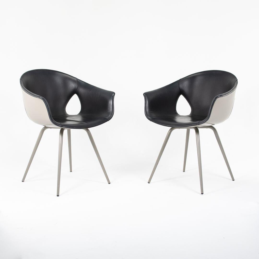 These are Ginger Ale dining chairs designed by Roberto Lazzeroni for Poltrona Frau. The listed price includes one dining chair, and we have two chairs available for individual purchase. 
 
 Each chair measures 21.7 inches in depth, 24.7 inches in