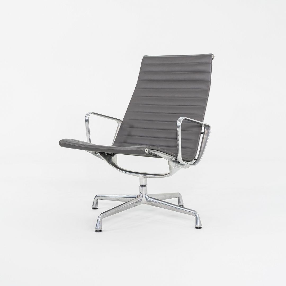 2013 Herman Miller Eames Aluminum Group Lounge Chairs in Grey Leather In Excellent Condition For Sale In Philadelphia, PA