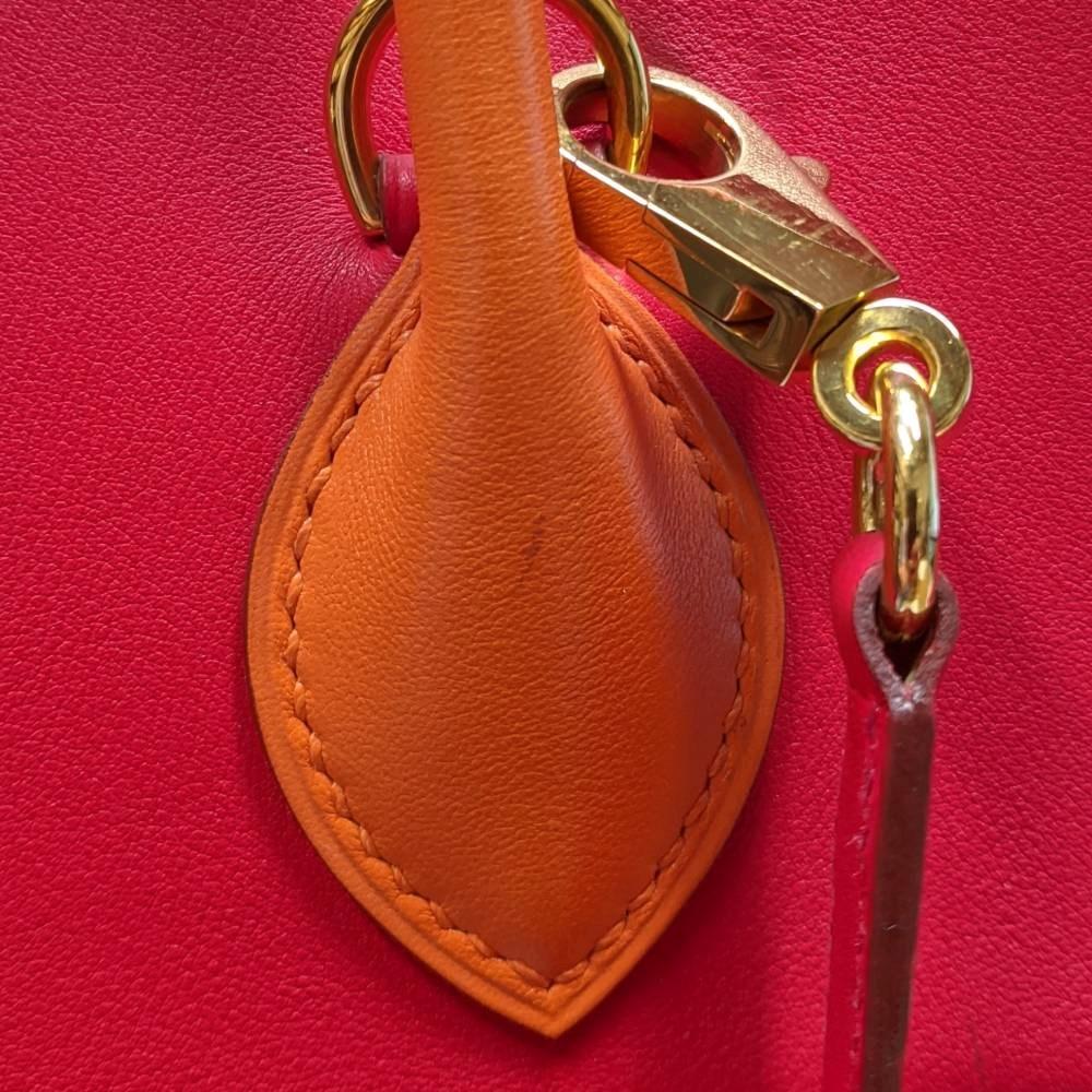 Women's 2013 Hermès Mallette red and light brown Bolide 2way bag