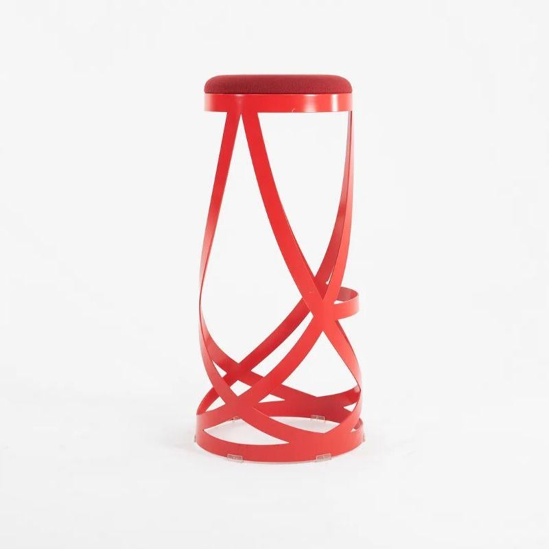 This is a Nendo High Ribbon Stool, designed by Nendo for Cappellini. Nendo is the name of a collective of professionals, under the guidance of architect Oki Sato. Each stool is constructed from a single sheet of metal, with sculptural laser-cut