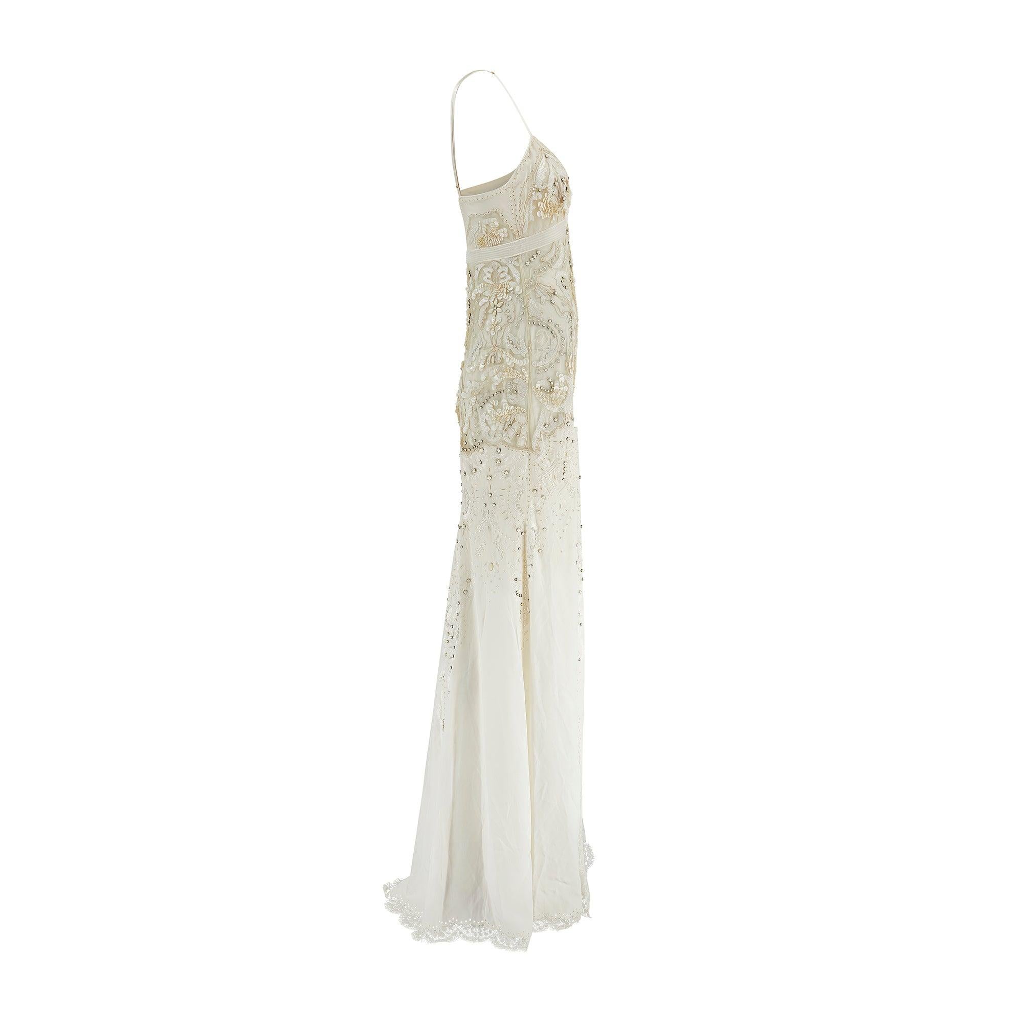 This embellished maxi dress was shown as part of Roberto Cavalli’s Resort 2013 collection (look 32/35). The collection took its cue from fine porcelain, borrowing the patterns and silhouettes of the most luxurious hand-painted vases. This gown is