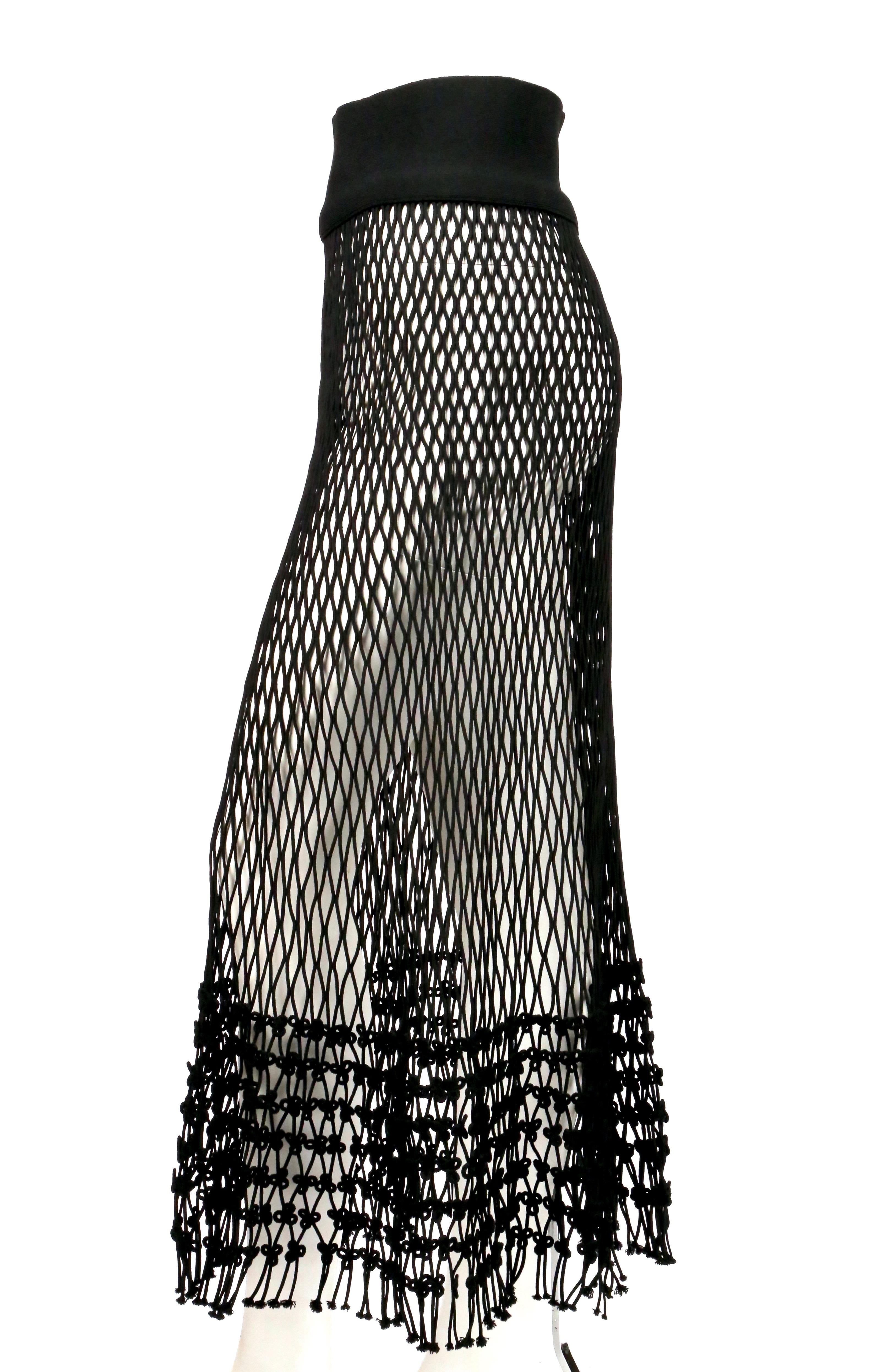 Jet-black, net skirt designed by Phoebe Philo for Celine exactly as seen on the spring 2014 runway and featured in the spring ad campaign. French size S. Approximate measurements (unstretched): waist 26