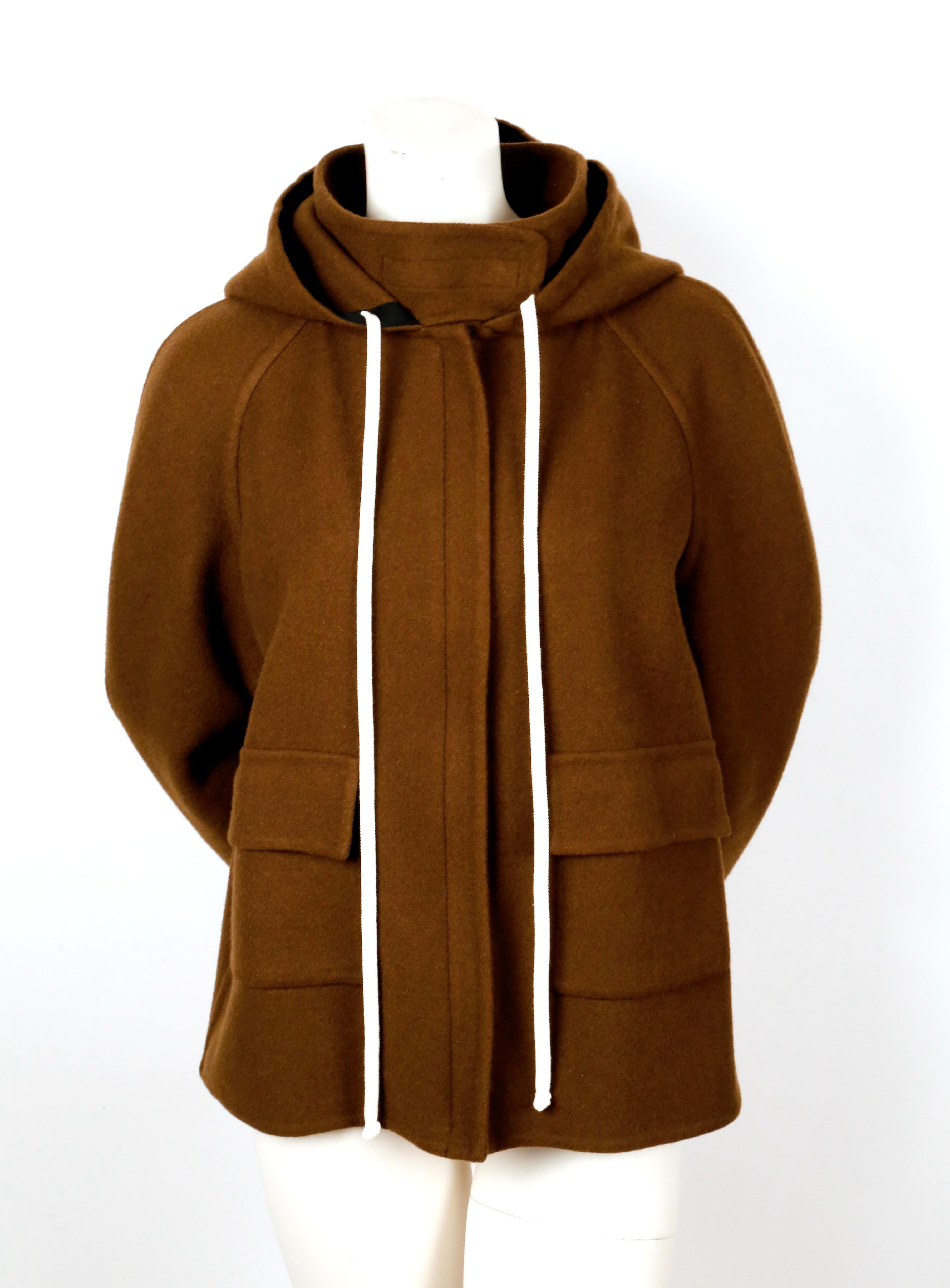 Brown, double-faced cashmere jacket with hood and patch pockets designed by Phoebe Philo for Celine as seen in the pre-fall collection of 2014. French size 38. Approximate measurements: bust 42