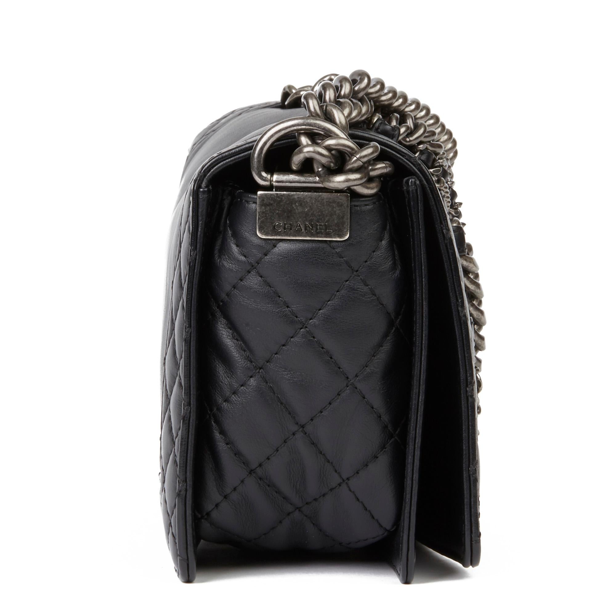 chanel calfskin quilted enchained flap black