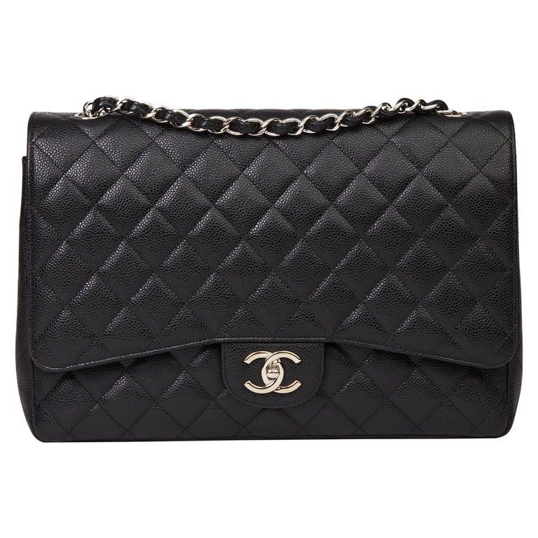 At Auction: A CHANEL BLACK QUILTED CAVIAR LEATHER MAXI CLASSIC DOUBLE FLAP  BAG. 22CM X 34CM. GOLD TONE HARDWARE, EXTERIOR OPEN POCKET, 4X INTERIOR  POCKETS. PLEASE SEE PHOTOS FOR CONDITION. COMES WITH