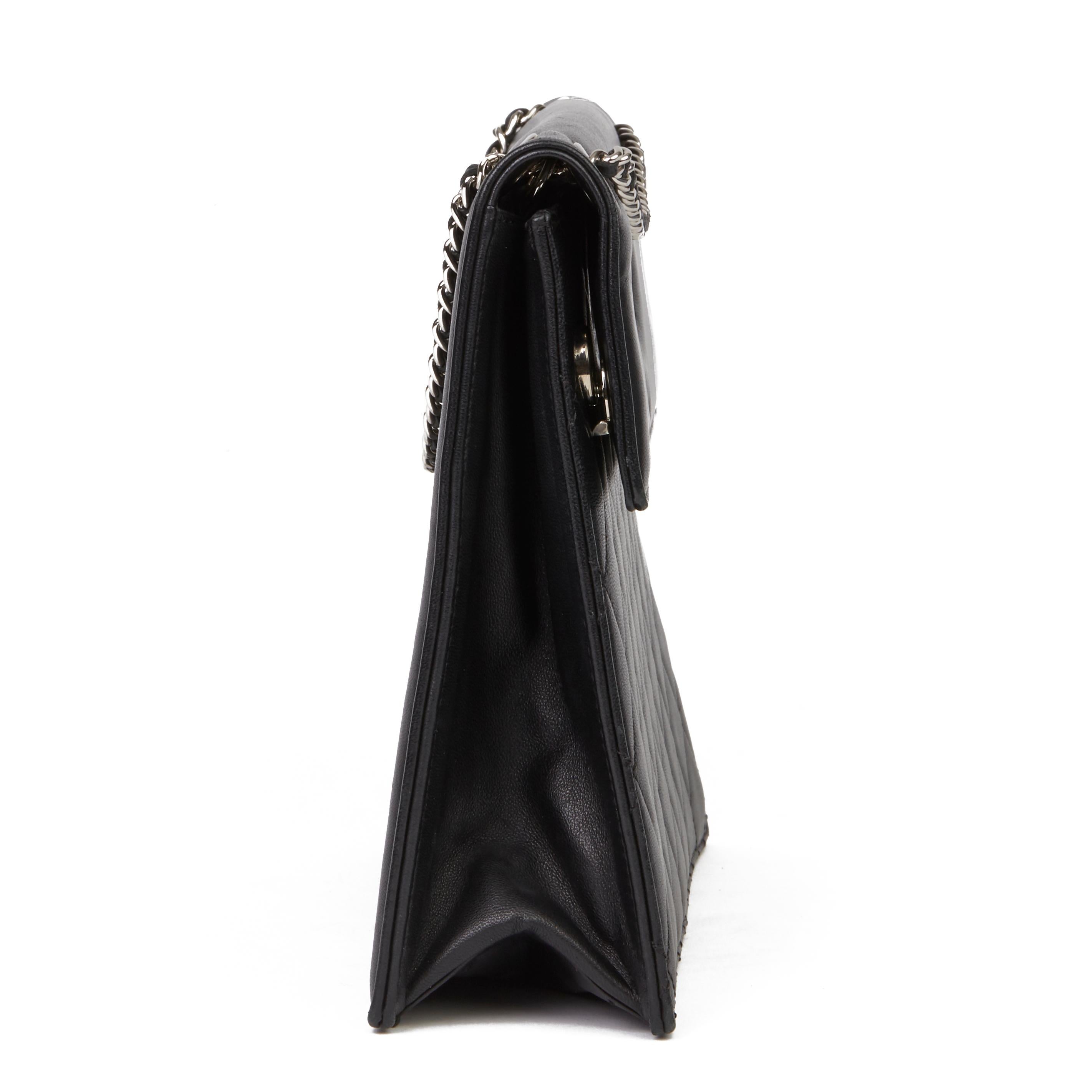 CHANEL
Black Quilted Lambskin Timeless Foldover Shoulder Bag

Xupes Reference: HB3541
Serial Number: 19377834
Age (Circa): 2014
Accompanied By: Chanel Dust Bag
Authenticity Details: Serial Sticker (Made in Italy)
Gender: Ladies
Type: Top Handle,