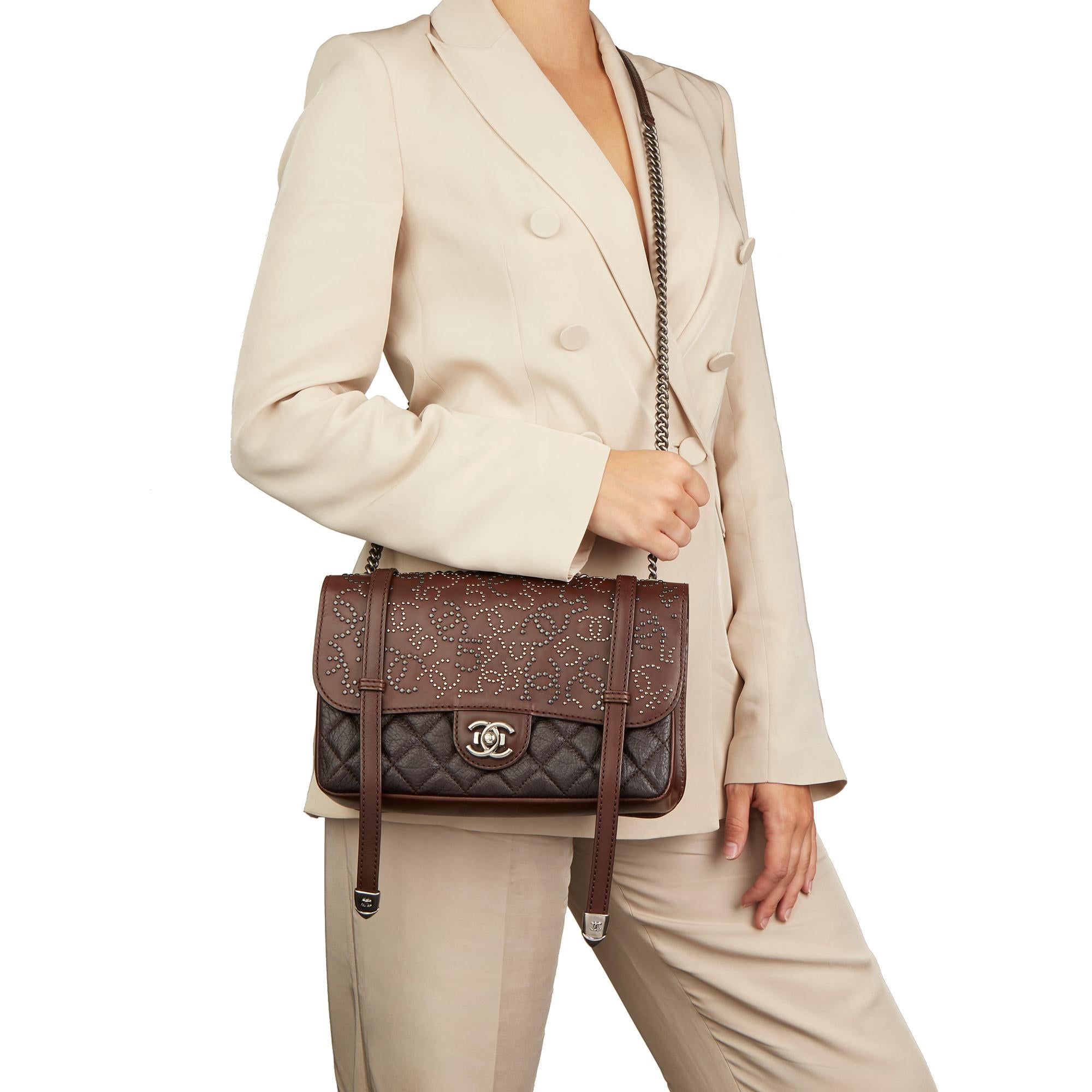 CHANEL
Brown Studded Calfskin Leather Paris-Dallas Studded Buckle Flap Bag

Xupes Reference: HB2872
Serial Number: 19752622
Age (Circa): 2014
Accompanied By: Chanel Dust Bag, Authenticity Card
Authenticity Details: Authenticity Card, Serial Sticker