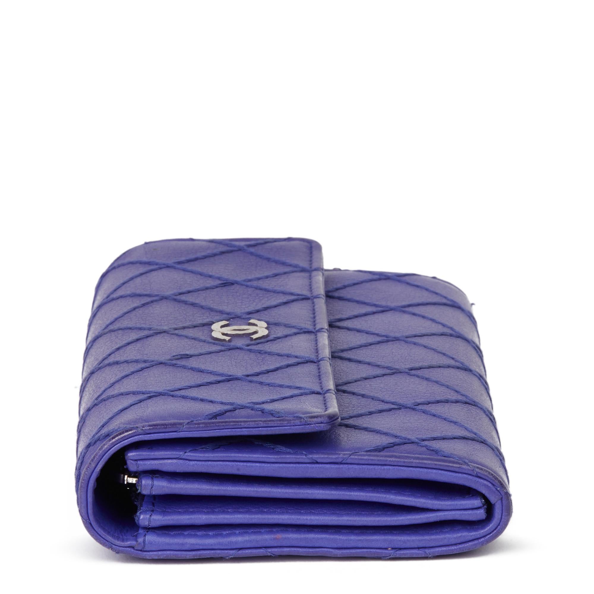 CHANEL
Electric Blue Quilted Lambskin Wallet 

Xupes Reference: HB3276
Serial Number: 19301605
Age (Circa): 2014
Accompanied By: Chanel Dust Bag 
Authenticity Details: Serial Sticker (Made in Italy) 
Gender: Ladies
Type: Accessory

Colour: Blue