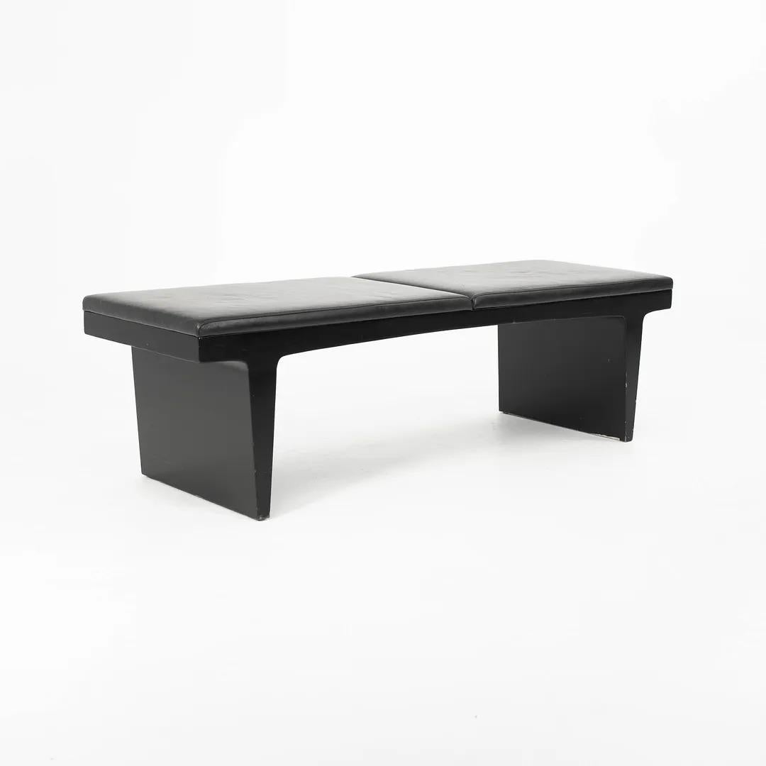 This is a single (the price listed is for each bench, though multiple benches are available) Egalite bench, designed by Suzanne Trocmé for Bernhardt Design. Its frame is composed of solid ebonized maple and it has a black leather upholstered seat.