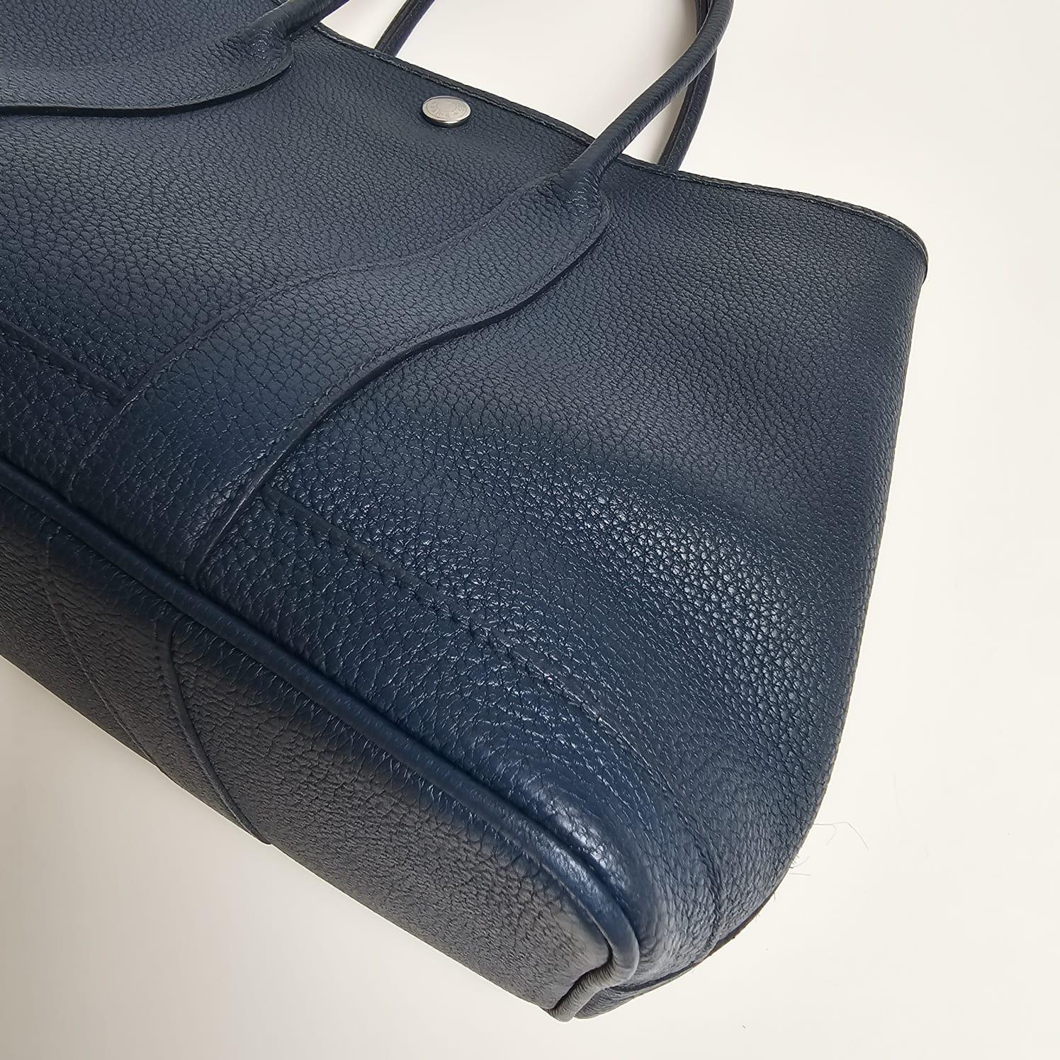 Classic garden party 30 bag in blue prusse. Classic everyday bag. Minor touch ups on the corners, but overall in good condition. Comes with a replacement dust bag. 