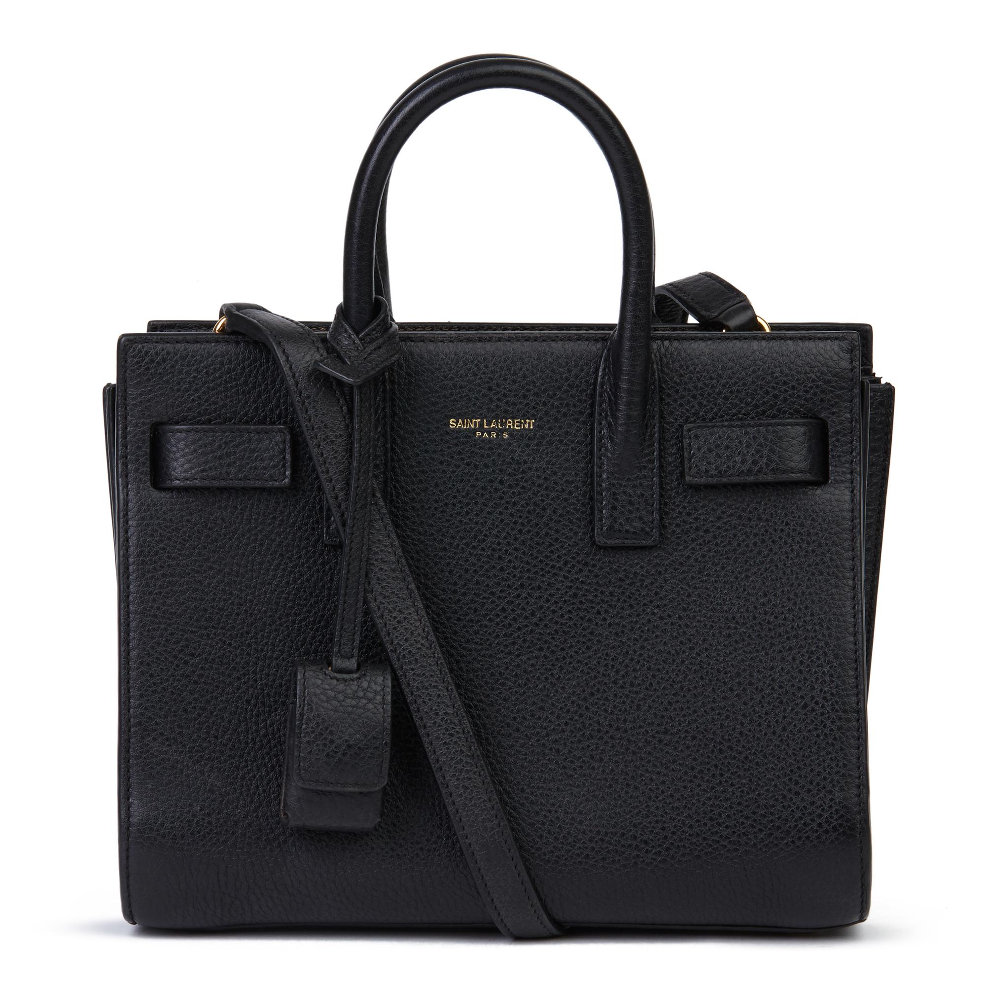SAINT LAURENT
Black Grained Calfskin Leather Mini Sac de Jour

Xupes Reference: HB3503
Serial Number: PLB340778-0814
Age (Circa): 2014
Accompanied By: Saint Laurent Dust Bag, Shoulder Strap
Authenticity Details: Serial Stamp (Made in Italy)
Gender:
