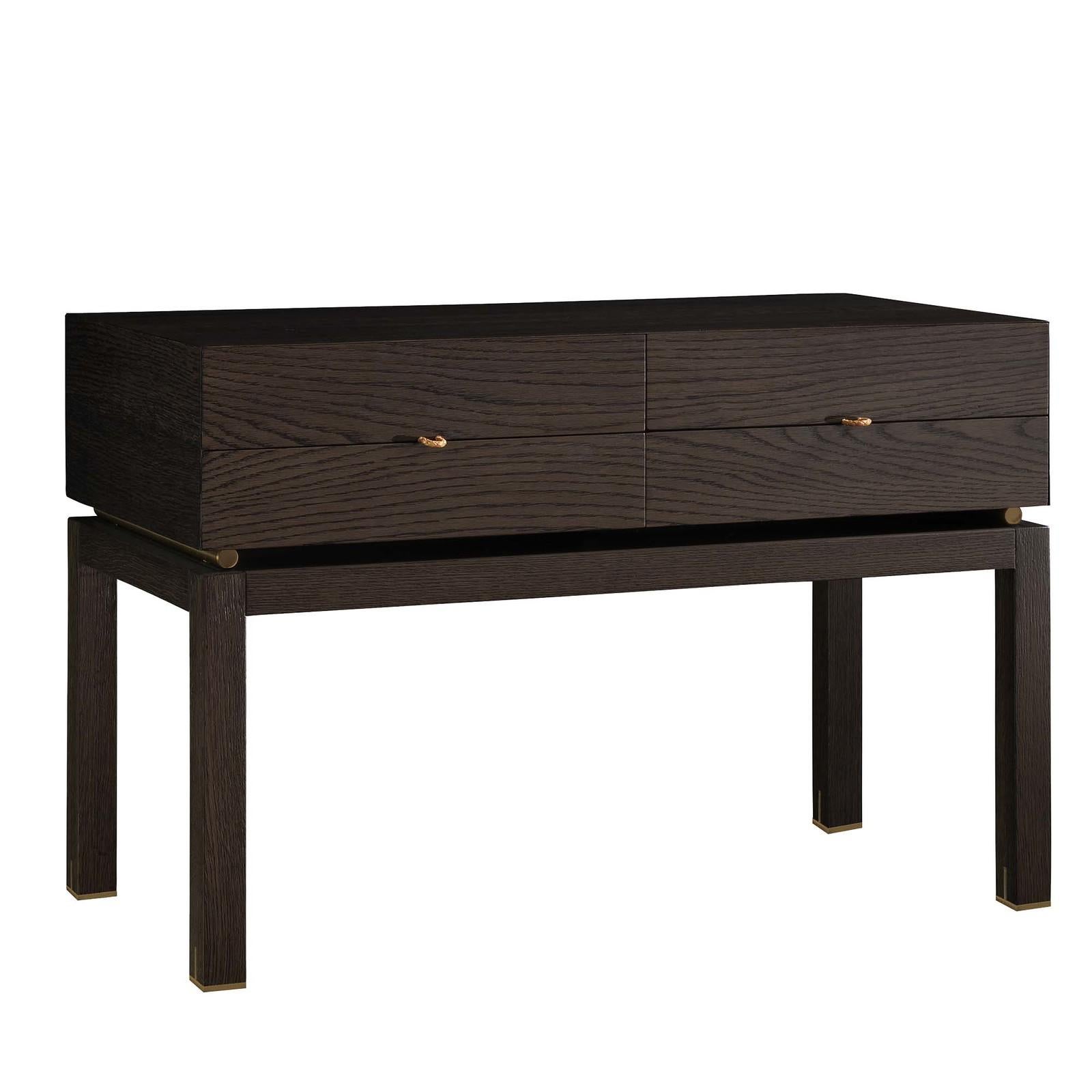 Crafted of stained oak in a rich dark brown hue, this side table strikes a clean-lined rectangular silhouette on four straight dowel legs. Set on two galvanized metal rods that raise the top adding lightness to the design, the four drawers with a