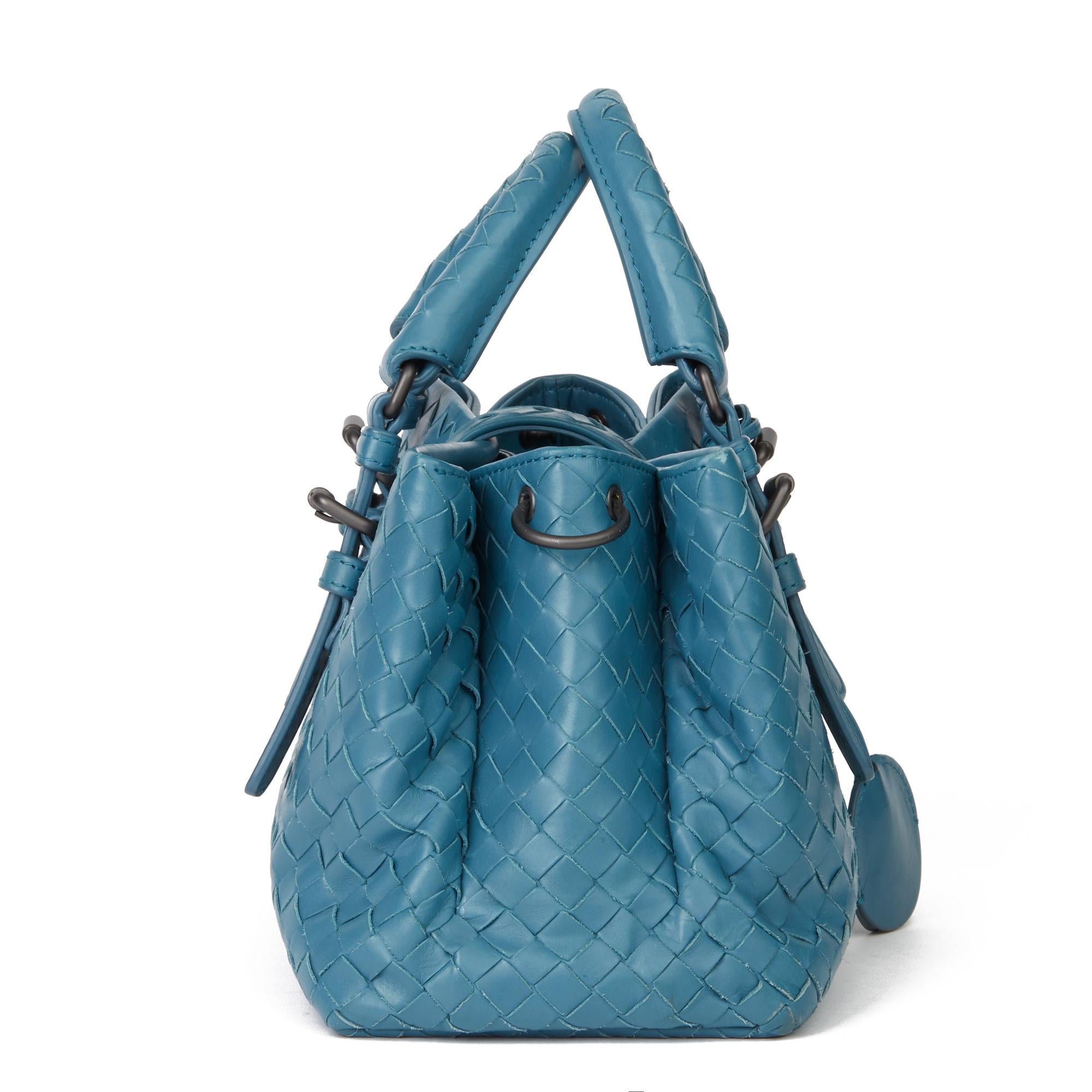 BOTTEGA VENETA
Blue Woven Calfskin Leather Mini Roma

Xupes Reference: HB2989
Serial Number: 806295059S
Age (Circa): 2015
Accompanied By: Bottega Veneta Dust Bag, Key, Clochette, Shoulder Strap
Authenticity Details: Serial Tag (Made in