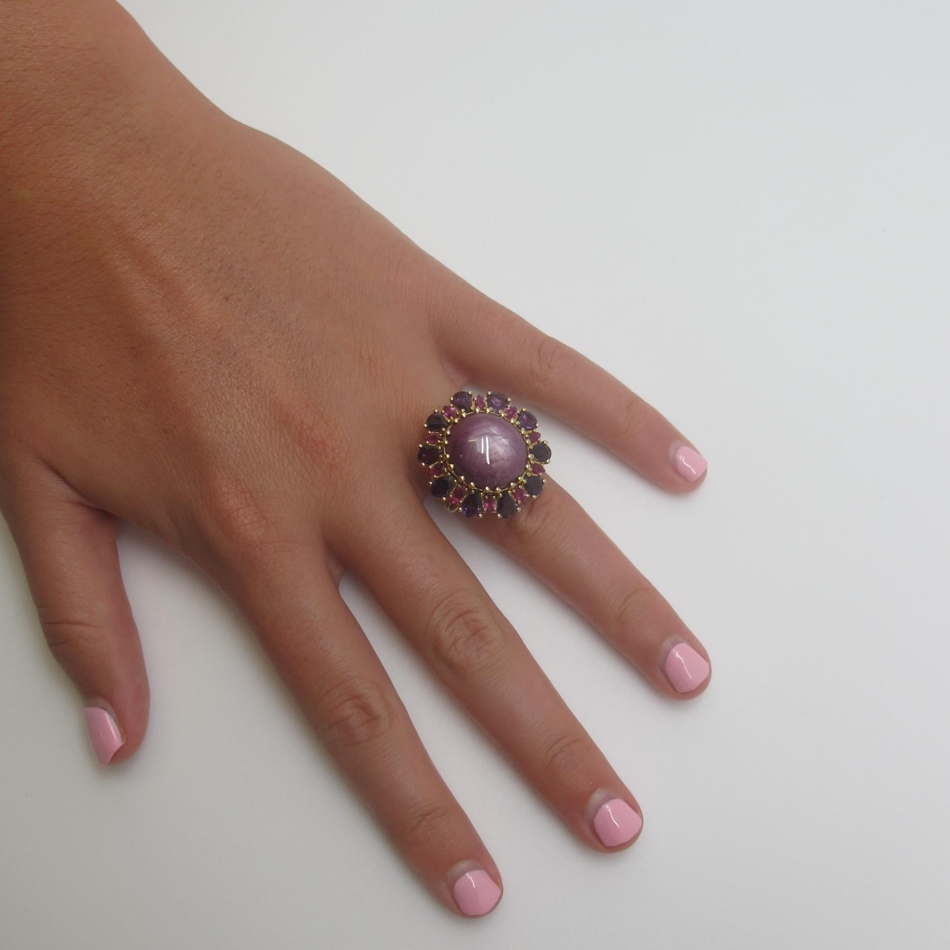 This amazingly handcrafted ring is as stunning as it is large. The striking floral shape combined with the impeccable detail is the perfect showcase of the high-quality work this company is known to generate. The oval star sapphire measures