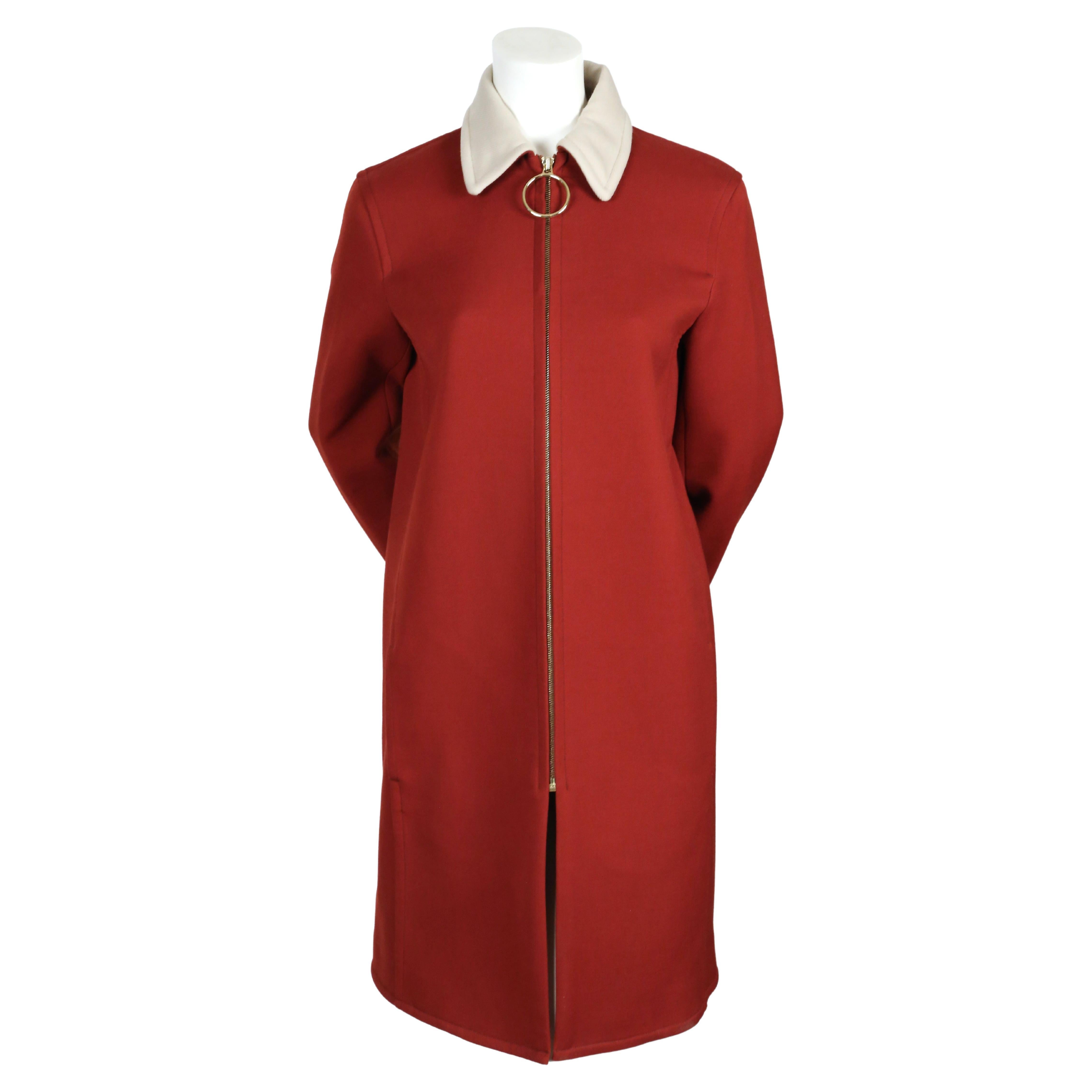  Rust colored gabardine wool coat with off-white collar and gold-tone O-ring ziper designed by Phoebe Philo for Celine exactly as seen in the pre-fall 2015 collection.  French size 38. The coat was not clipped on the size 2 mannequin. Approximate