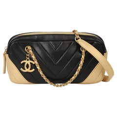 2015 Chanel Schwarz & Gold Chevron gesteppt Lammfell zeitlosen Charme Kameratasche