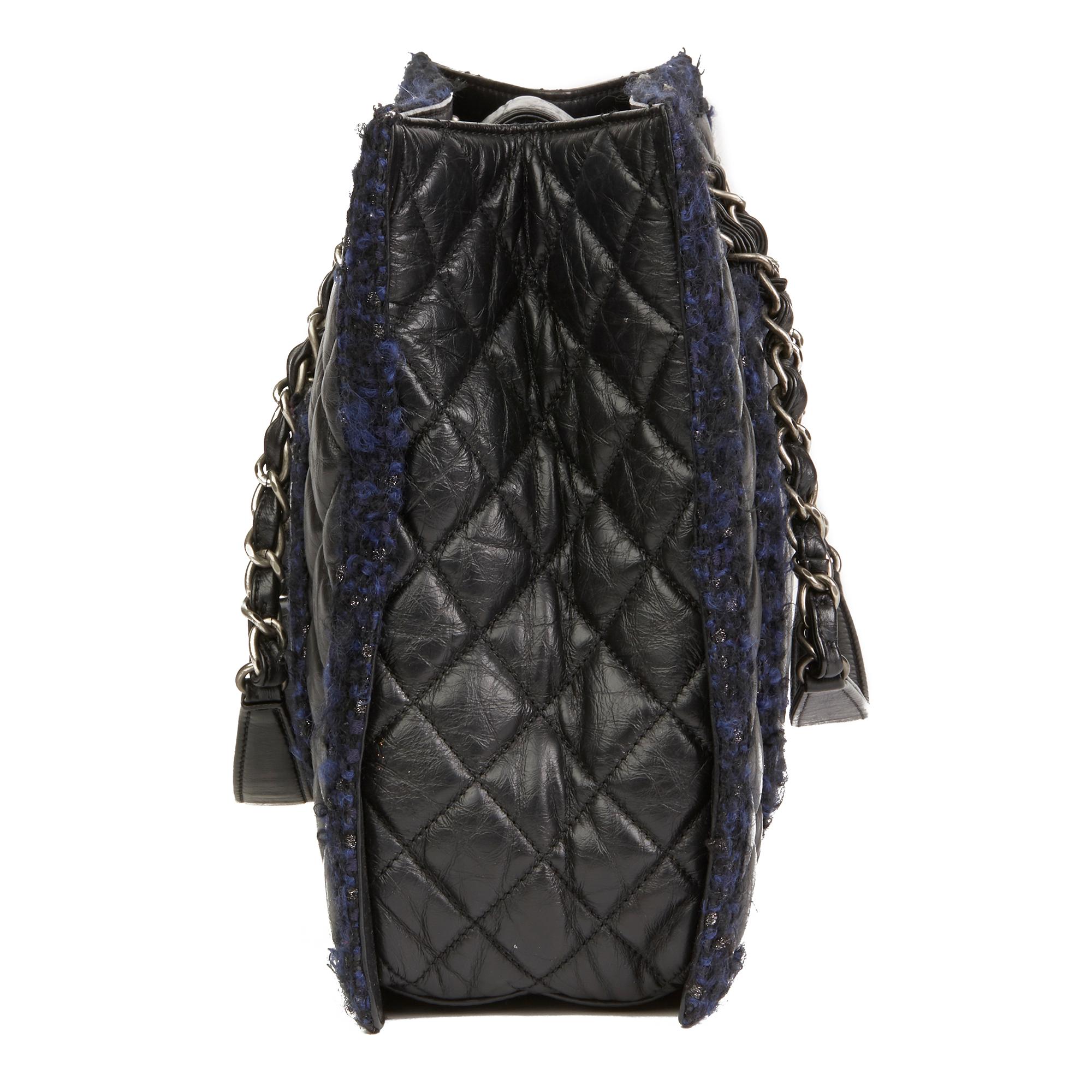 CHANEL
Black Quilted Aged Quilted Calfskin Leather & Navy Tweed Grand Shopping Tote GST

Reference: HB2539
Serial Number: 20143565
Age (Circa): 2015
Accompanied By: Chanel Dust Bag
Authenticity Details: Serial Sticker (Made in Italy)
Gender: