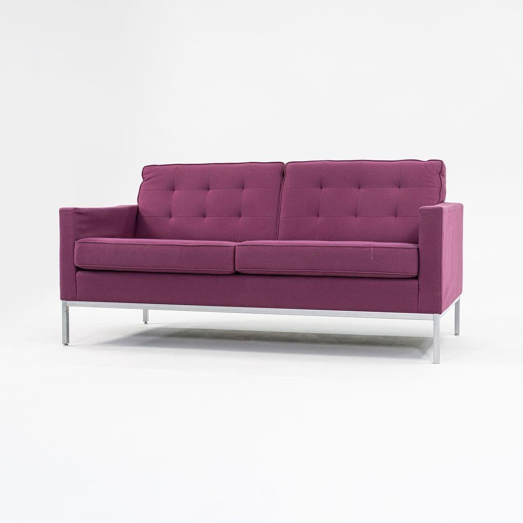 This is an original Florence Knoll Settee Sofa, Model 1205S2, designed by Florence Knoll for Knoll in 1954. This particular example was produced by Knoll Studio in the USA in 2015. It features an exposed square tubular-steel frame and is upholstered
