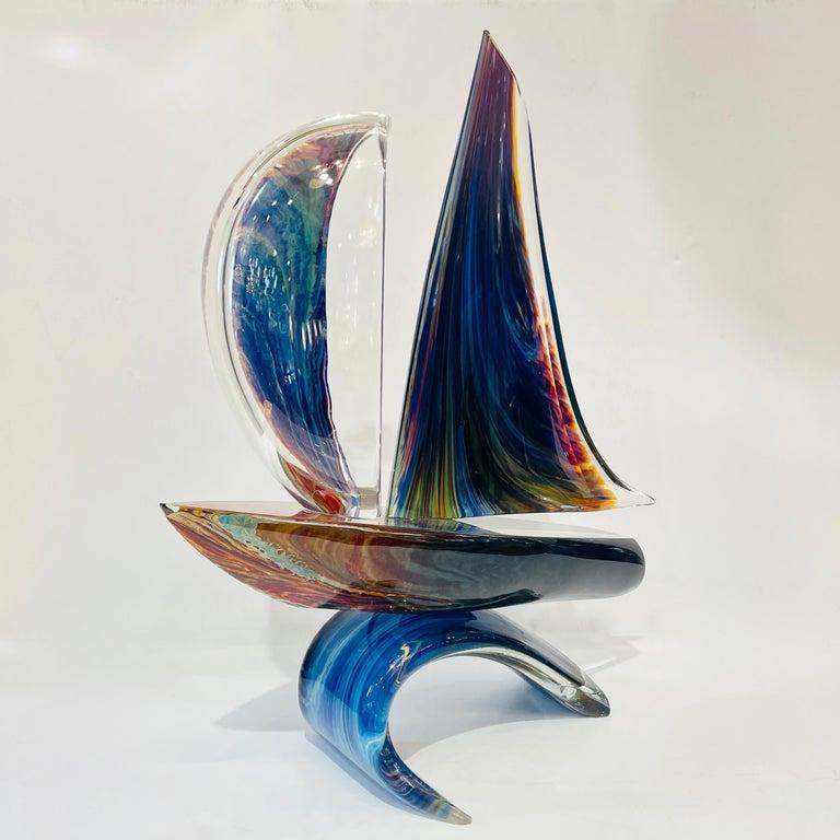 A sailing boat, a modern Art sculpture in overlaid Murano glass, signed piece, blown by Luigi Moro, custom made at Vetrerie Riunite Colleoni on the Murano island, worked with the difficult technique Calcedonio glass, to resemble the Chalcedony stone