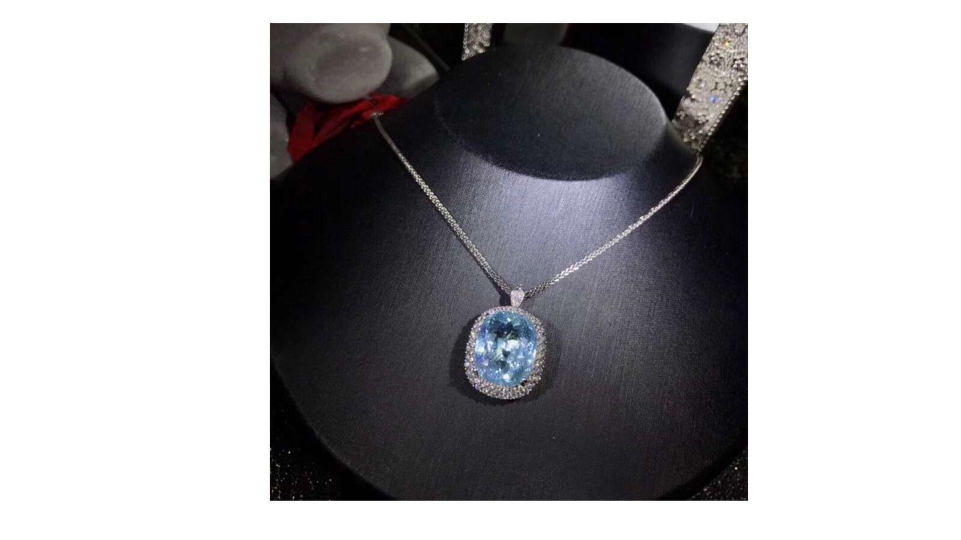 
This is a very rare Paraiba Tourmaline Necklace and also you have a options of a ring .   It shows off 20.15CT  and 64 diamonds 

This is a Extremely rare Neon Blue Paraiba Tourmaline Necklace  20.15 ct  with 87 diamonds set in 18k White Gold


The