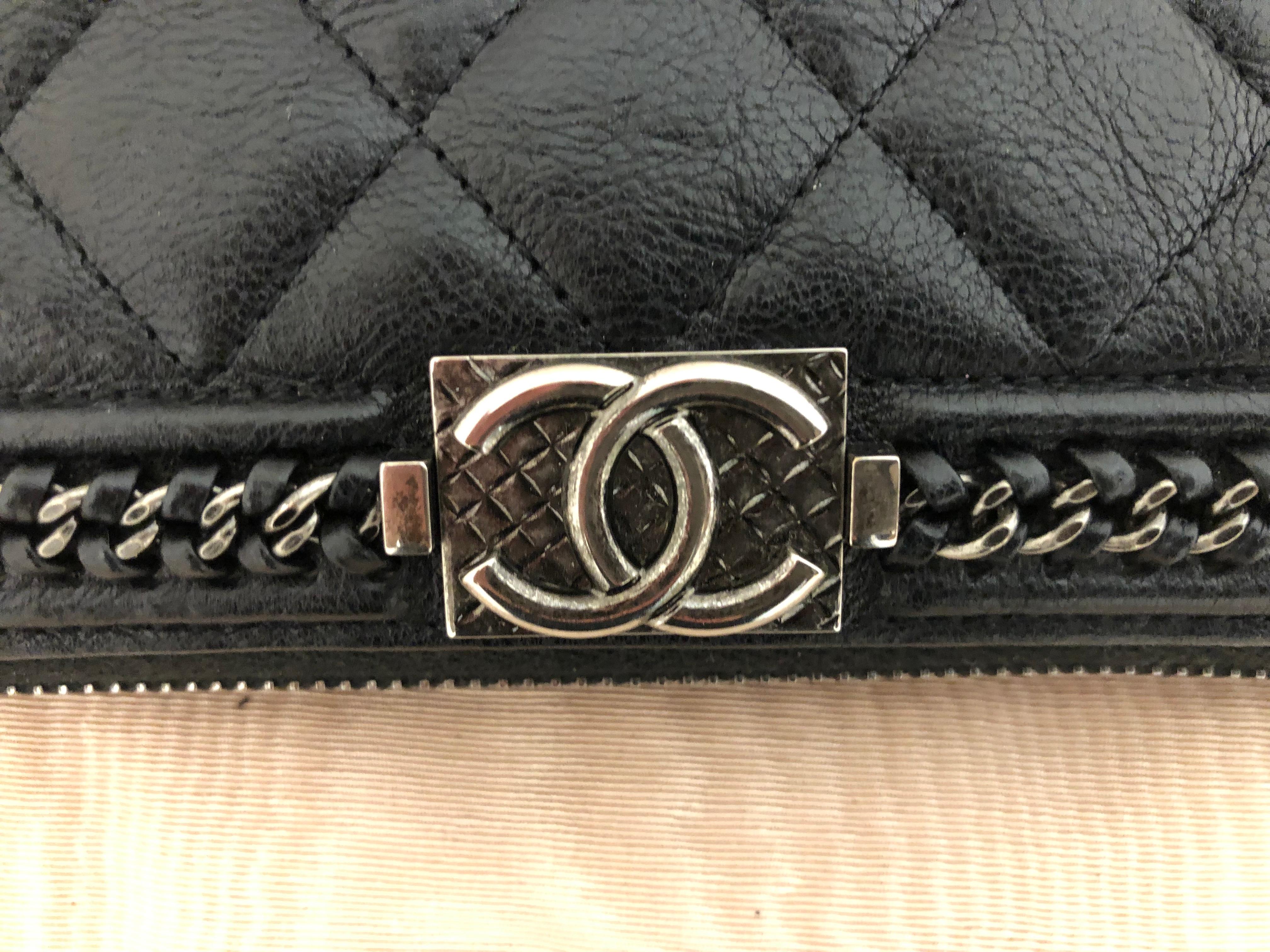 It is a zip around limited edition 2016-17 long wallet/clutch in as new condition, made in France. The limited edition relates to the chain trim embellishment. The pattern caviar leather is distressed and there is a CC, I believe ruthenium quilted