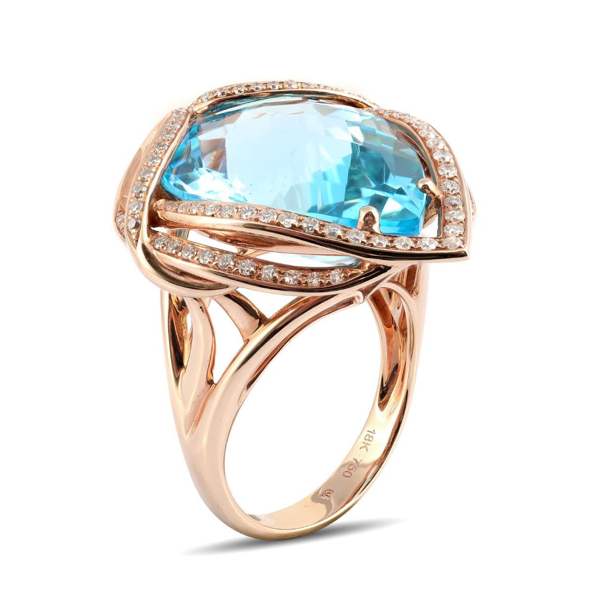 Elevate your style with this stunning designer ring. It features a captivating 20.16-carat sky blue Topaz as its centerpiece, drawing all eyes to its breathtaking beauty. The shank of the ring is an intricate work of art, twisting and turning as it