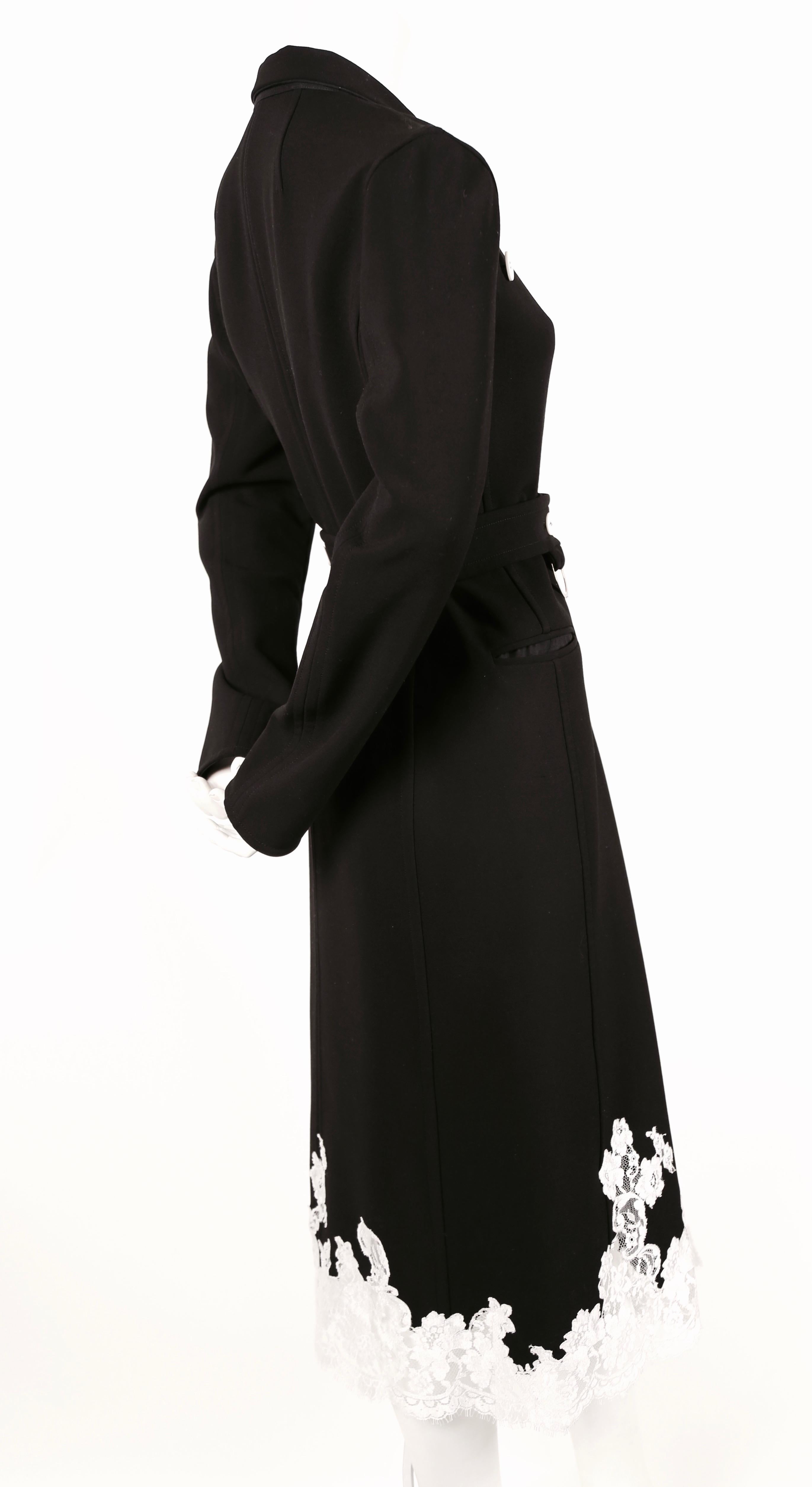 Black stretch wool trench with white lace trim designed by Phoebe Philo for Celine exactly as seen on the spring 2016 runway. French size 38. Approximate measurements: shoulder 17