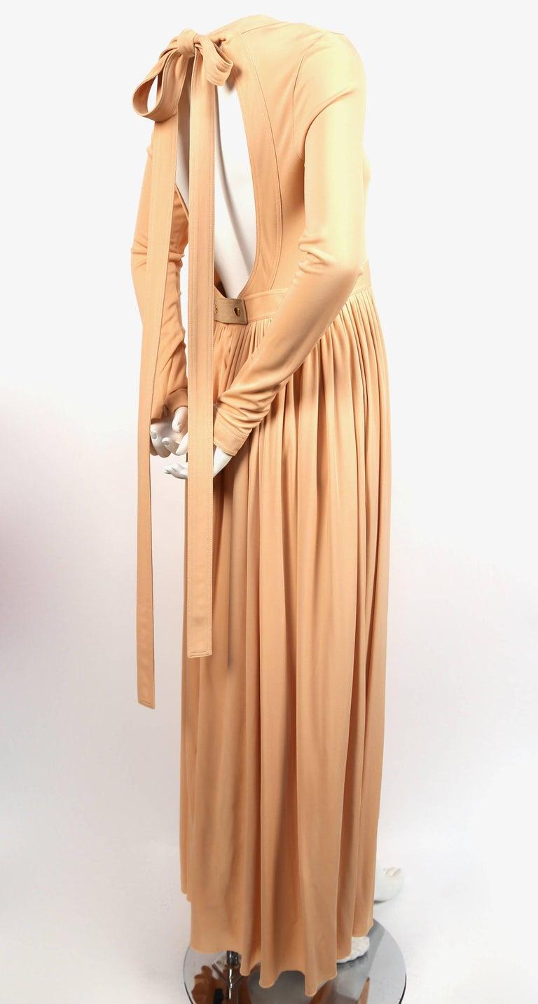 Slinky peach viscose dress with gathered waist, suede accent and open back with long neck ties designed by Phoebe Philo for Celine exactly as seen on the spring 2016 runway. French size 40 however this dress runs a little smaller and would best fit
