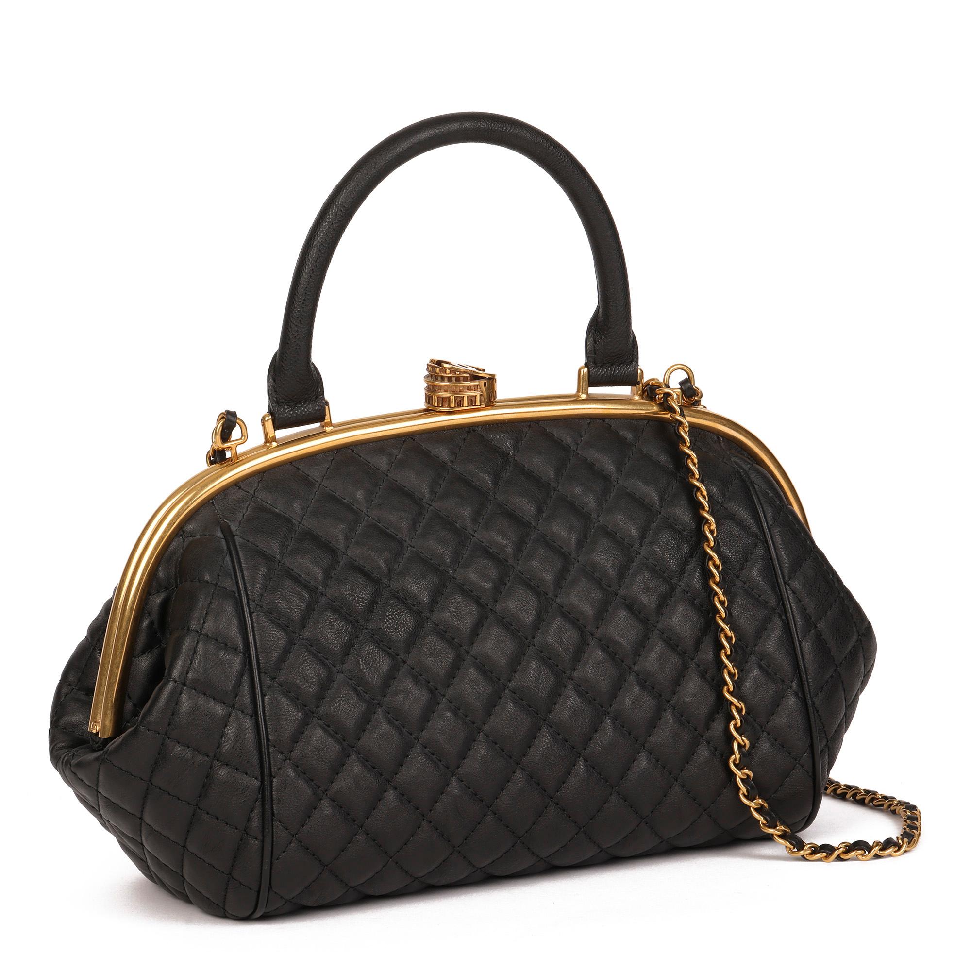 CHANEL
Black Quilted Calfskin Leather Paris in Rome Colosseum Kiss Lock Bowling Bag

Xupes Reference: CB474
Serial Number: 23115378
Age (Circa): 2016
Accompanied By: Chanel Dust Bag, Authenticity Card, Care Booklet
Authenticity Details: Authenticity