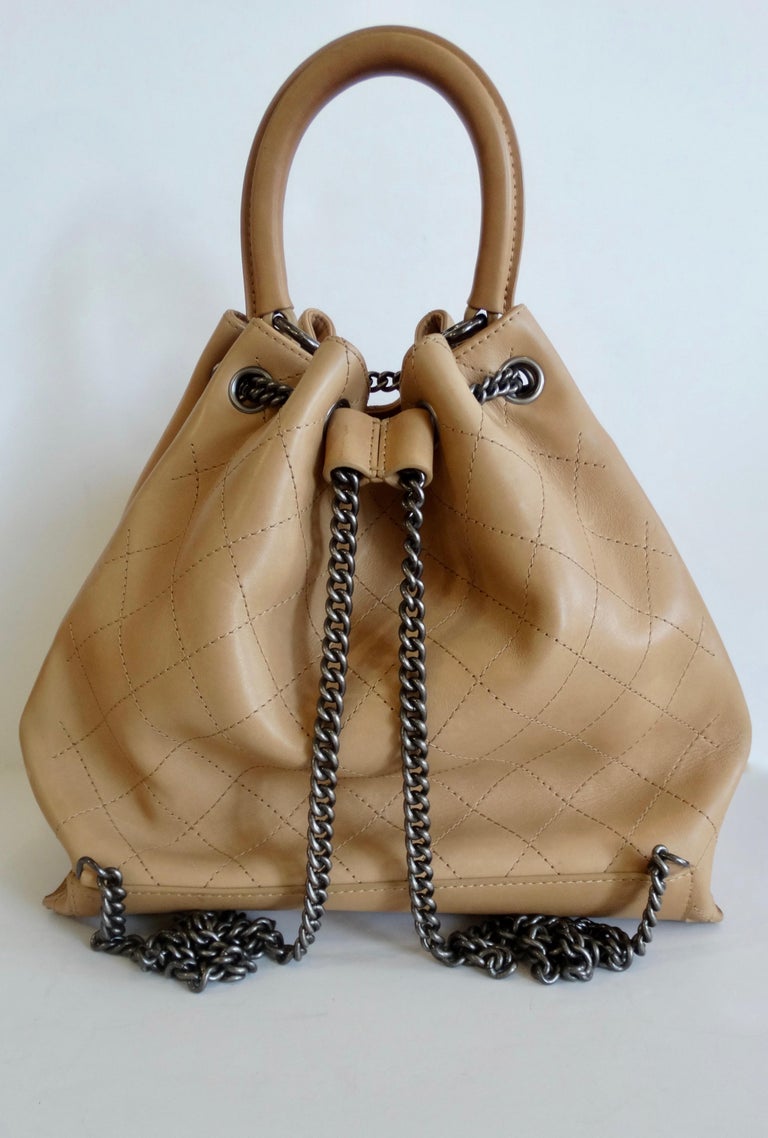 Chanel 2016 Tan Quilted Drawstring Backpack  In Good Condition For Sale In Scottsdale, AZ