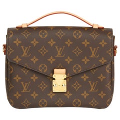 Used 2016 Louis Vuitton Brown Monogram Coated Canvas Pochette Metis