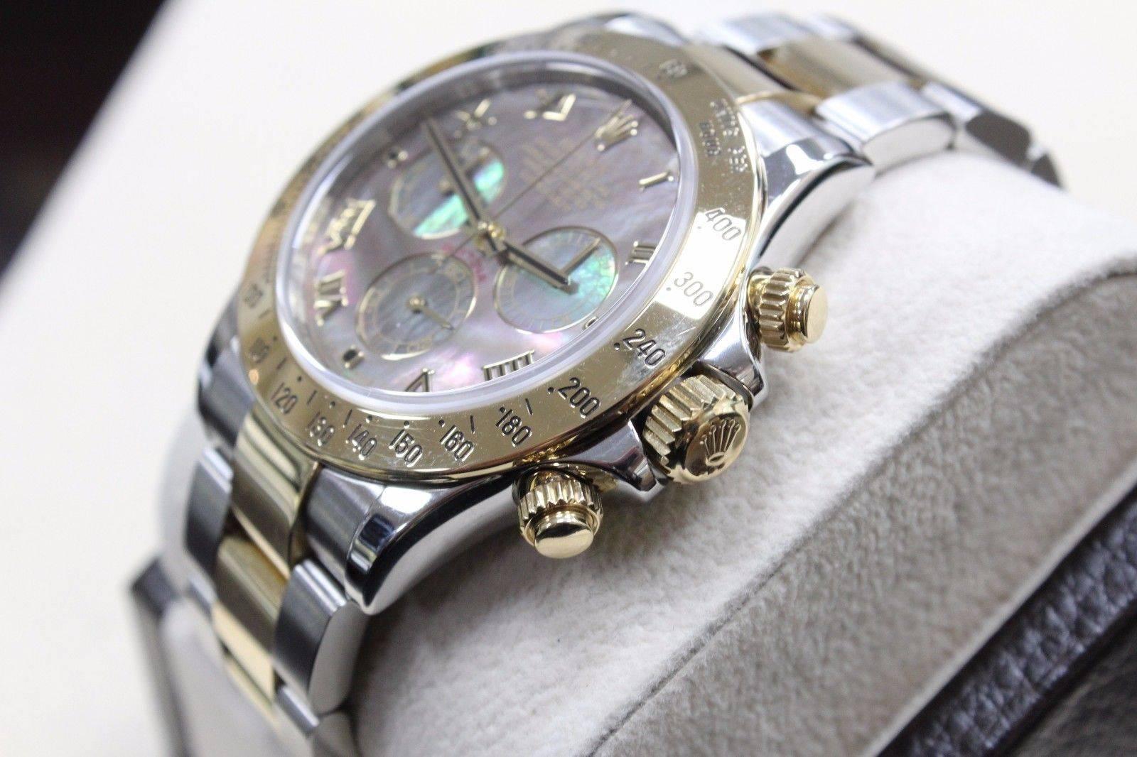 Men's 2016 Rolex Daytona 116523 18 Karat Gold and Stainless Black Mother-of-Pearl Dial