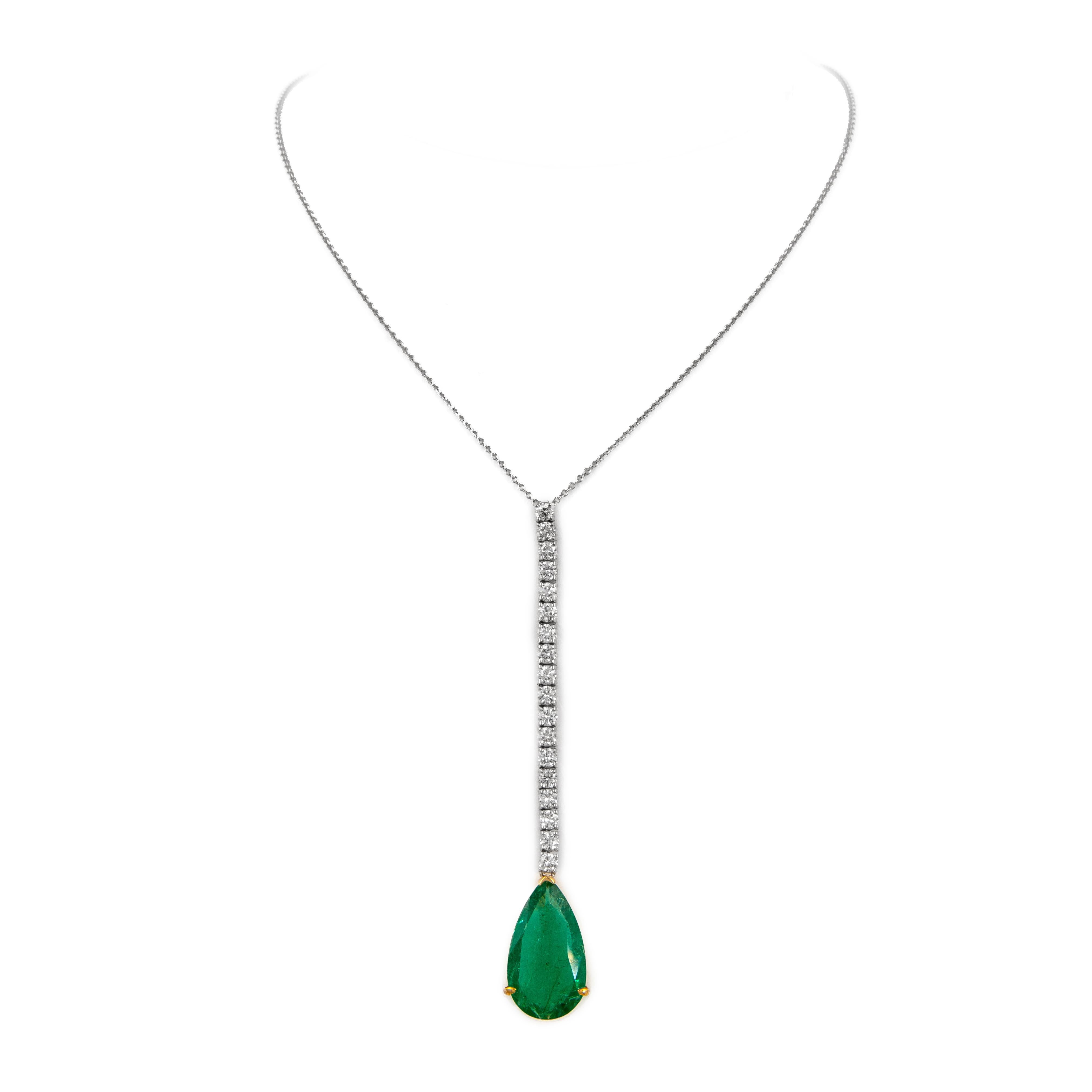 Lovely emerald and diamond drop necklace.
22.32 carats total gemstone weight.
20.16 carat oval emerald, apx F2. 18 round brilliant diamonds, 2.16 carats. Approximately H/I color and VS2/SI1 clarity. 18-karat white gold, 8.71 grams,