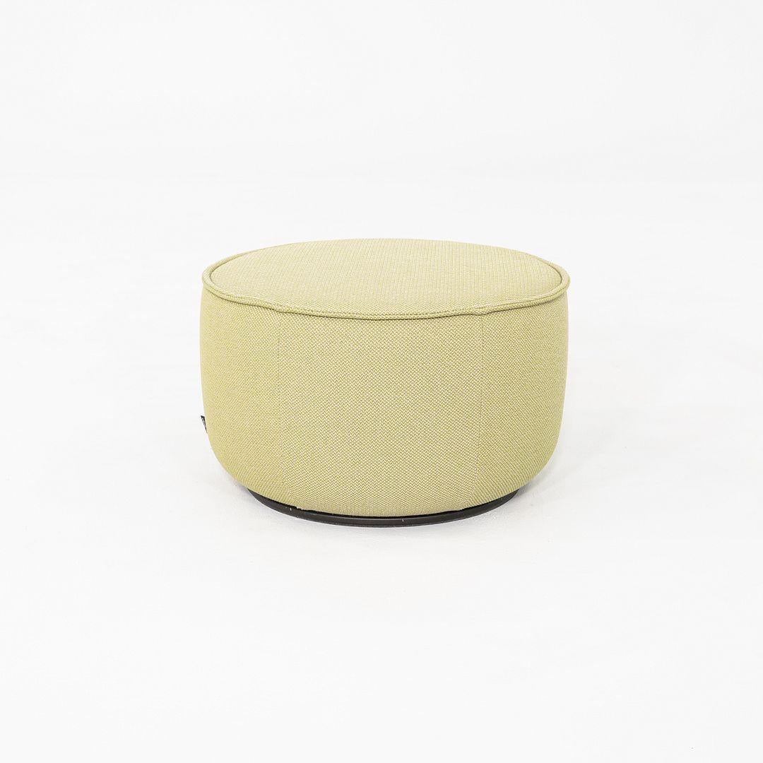 This is a Mariposa Pouf, medium size, originally designed by Edward Barber and Jay Osgerby for Vitra in 2014. These particular examples were produced in Germany in 2017. The poufs feature a softly rounded, geometric form and are upholstered in a